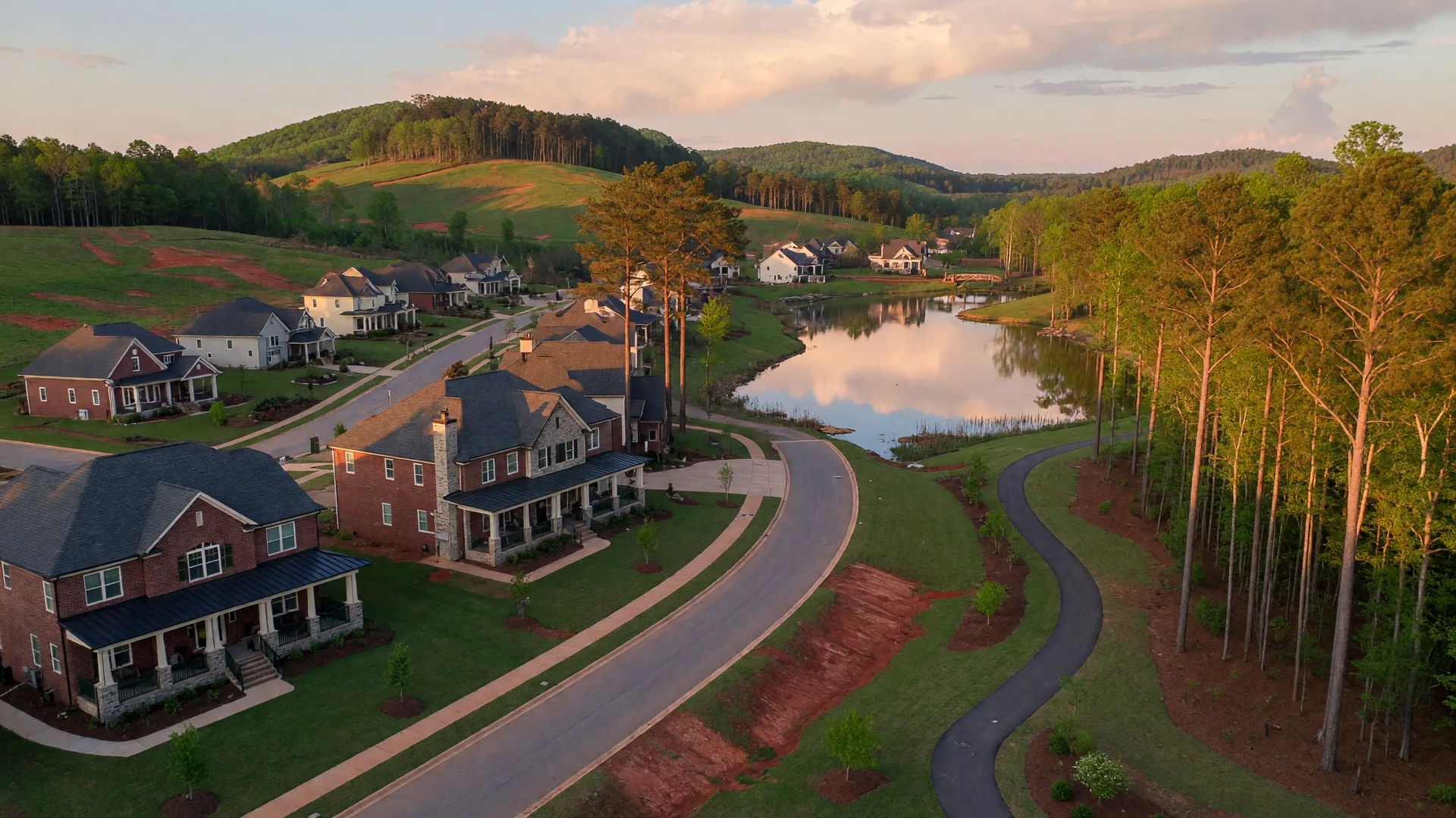 New construction traditional and craftsman homes in the Birmingham metro area with Appalachian foothills terrain and mature trees