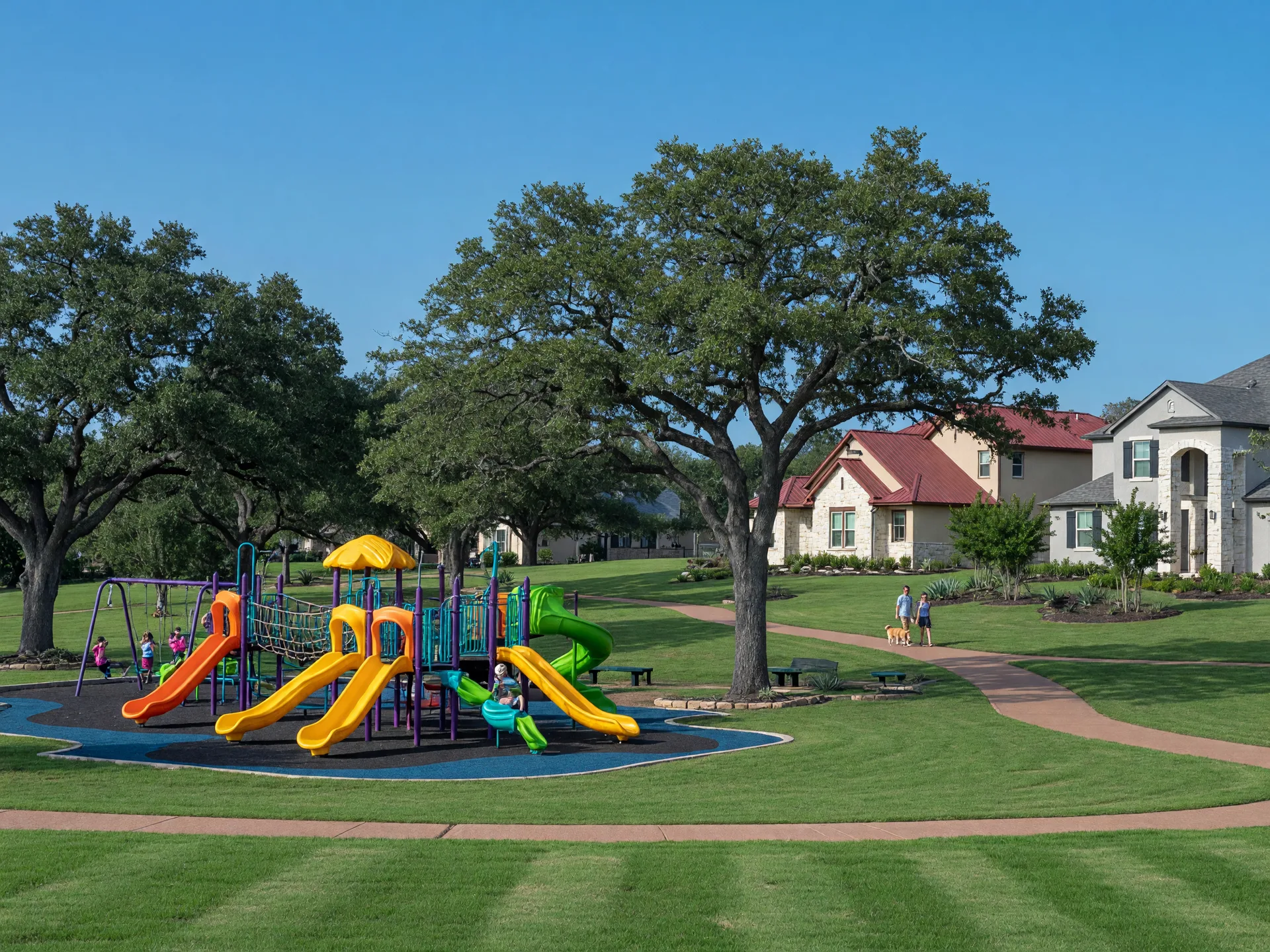 Community park with playground equipment, trees, and suburban homes in the background. Illustrative image; not a photograph of Regent Park.