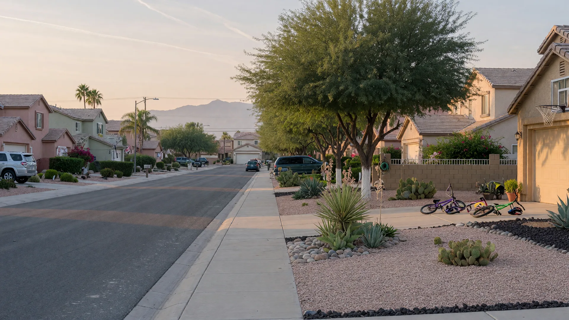 A quiet tree-lined street of well-kept homes in Green Valley, Henderson, representative illustrative imagery