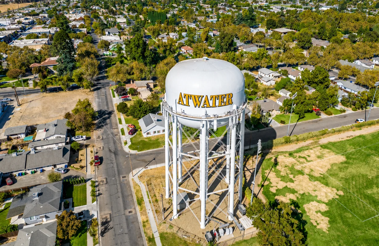 Aerial view of the Atwater, California water tower with yellow ATWATER lettering