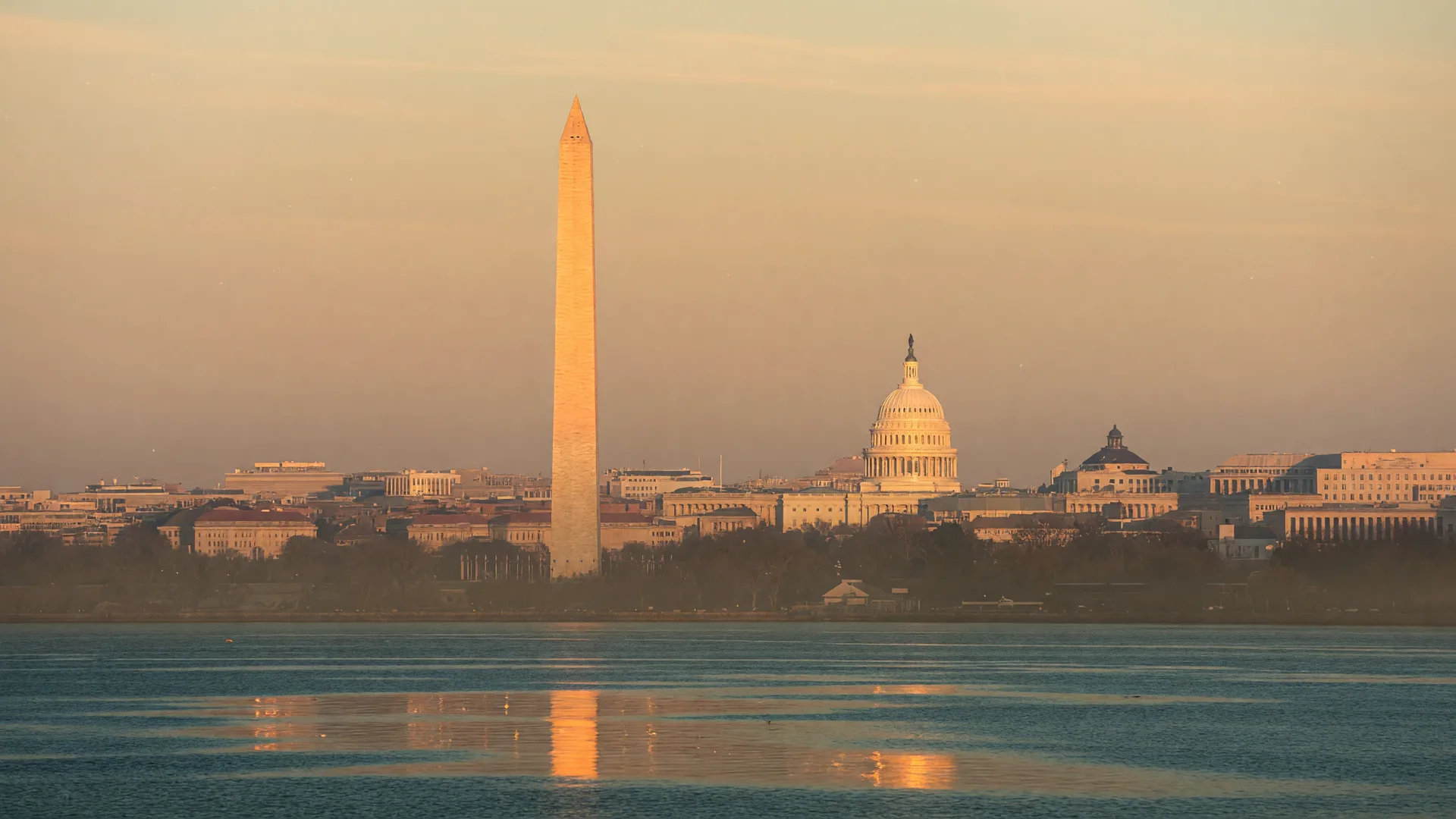 The Washington DC skyline across the river in warm late-afternoon light