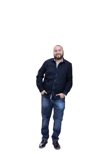 Ernesto Ramirez, Arizona real estate agent, in a black button-down shirt