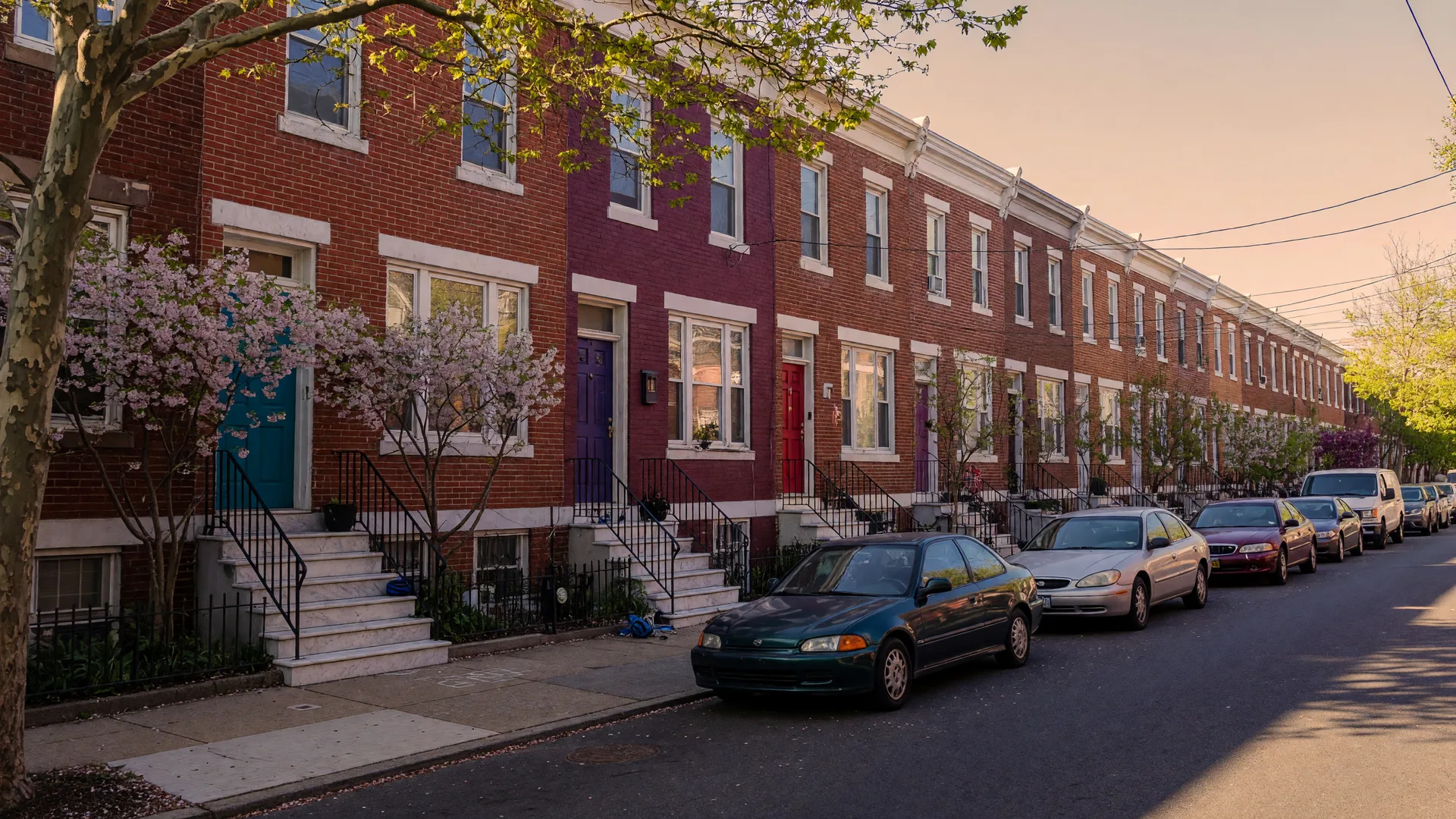 Classic Philadelphia rowhomes on a tree-lined street in Point Breeze