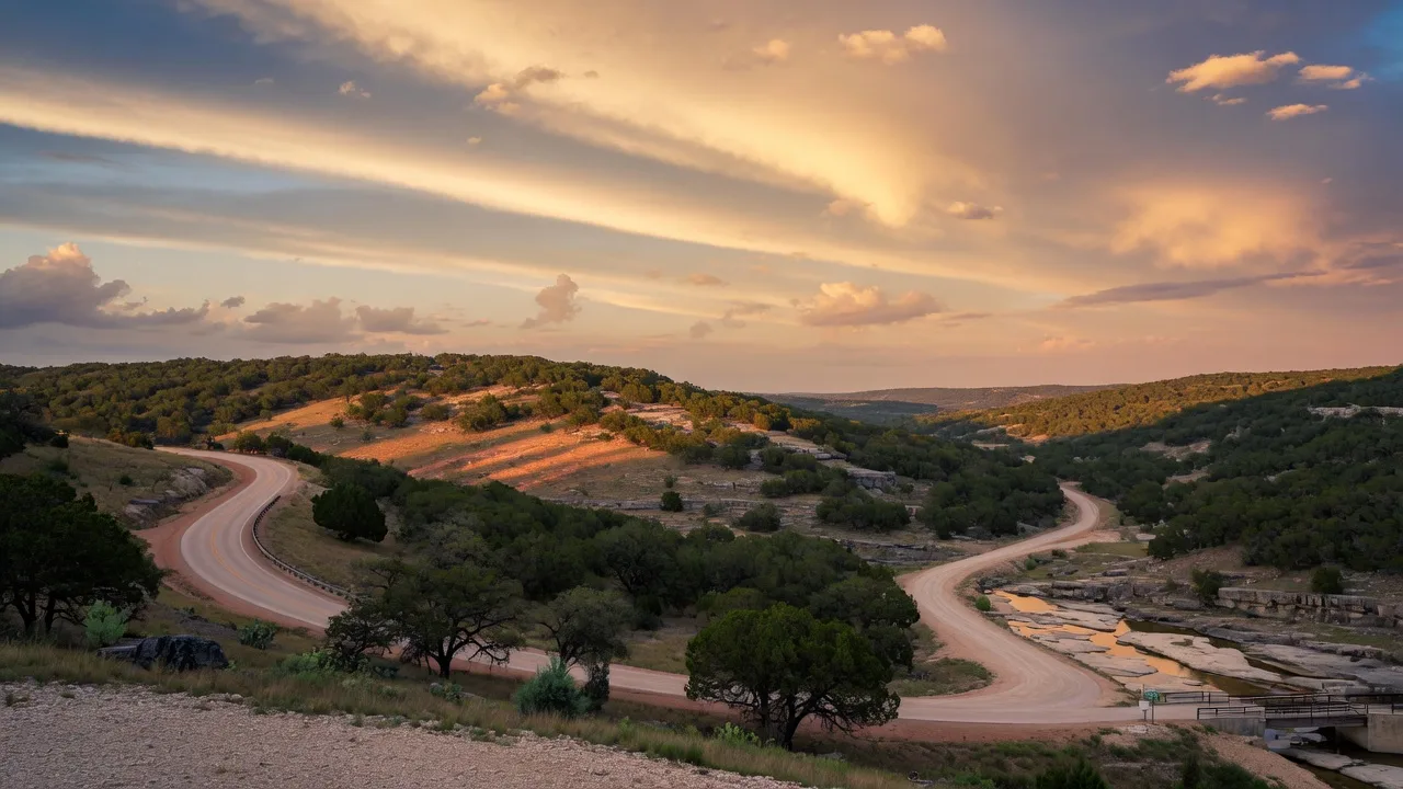 Sweeping view of rolling Texas Hill Country hills at golden hour, the backdrop to San Antonio real estate
