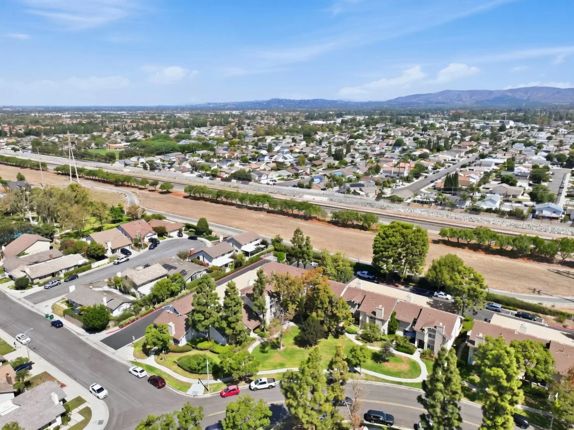 Clean aerial view of the Irvine community around 8 Silverwood with bike trails and nearby shopping and dining