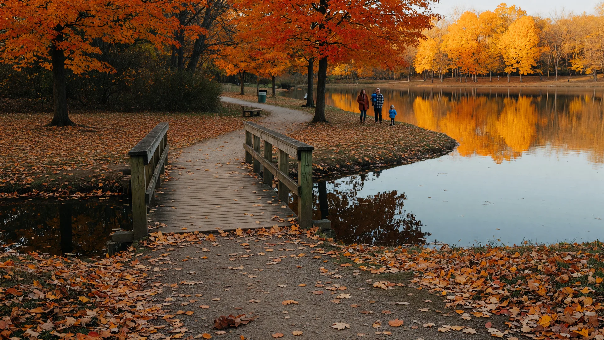 Golden autumn lake and trail in a Northeast Ohio park in October