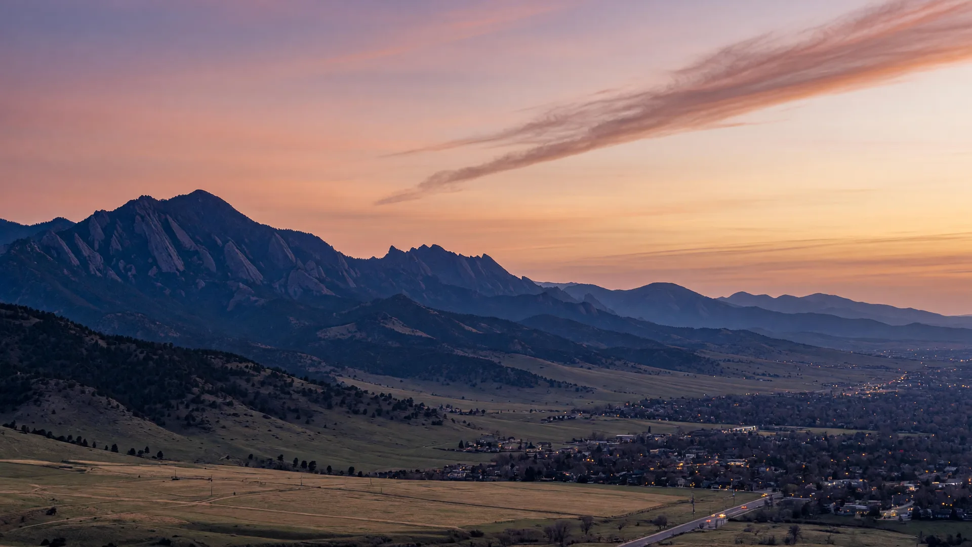 The Flatirons and Front Range foothills west of Broomfield, Colorado at dusk