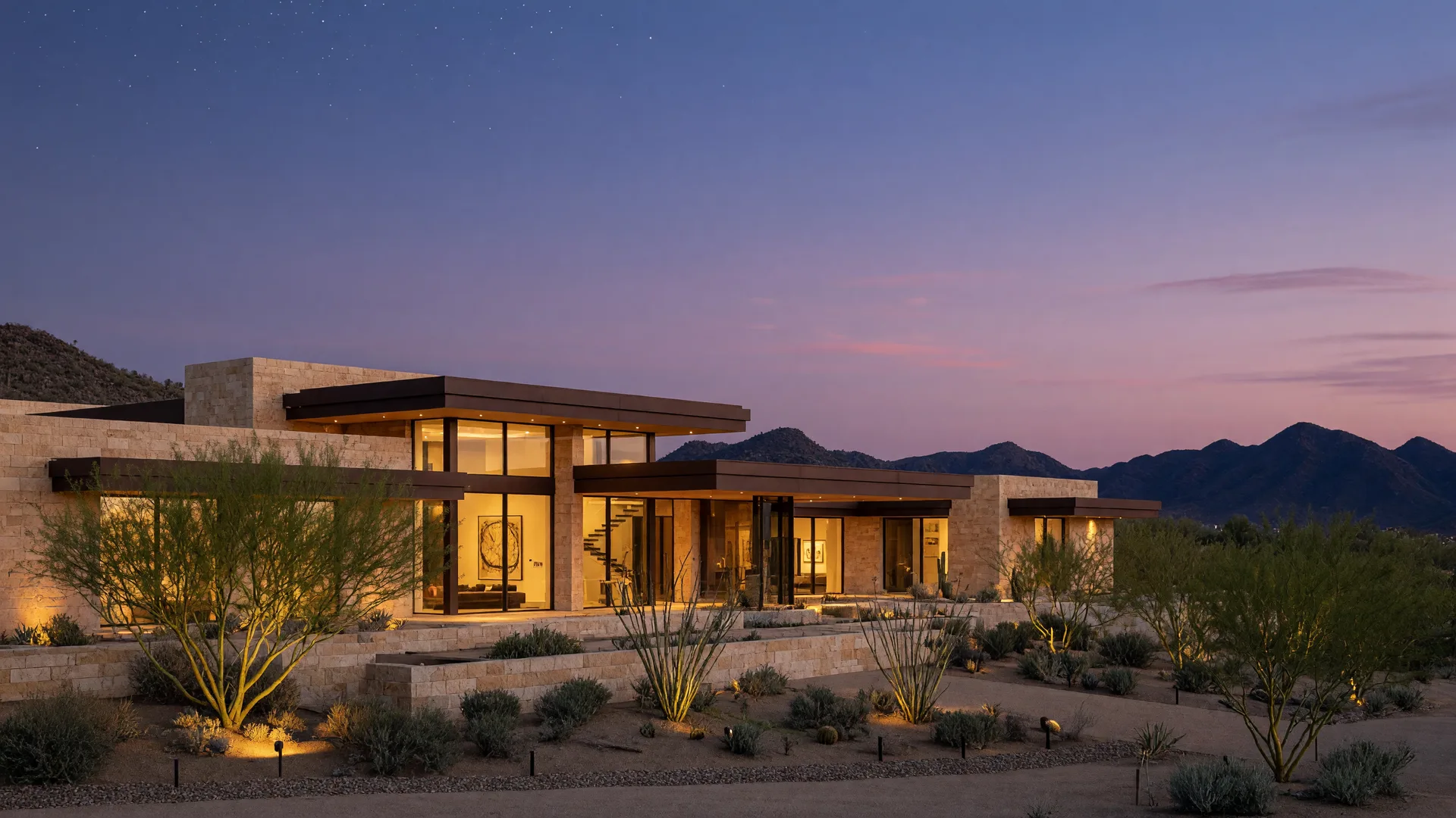 Modern luxury desert estate in North Scottsdale glowing at dusk
