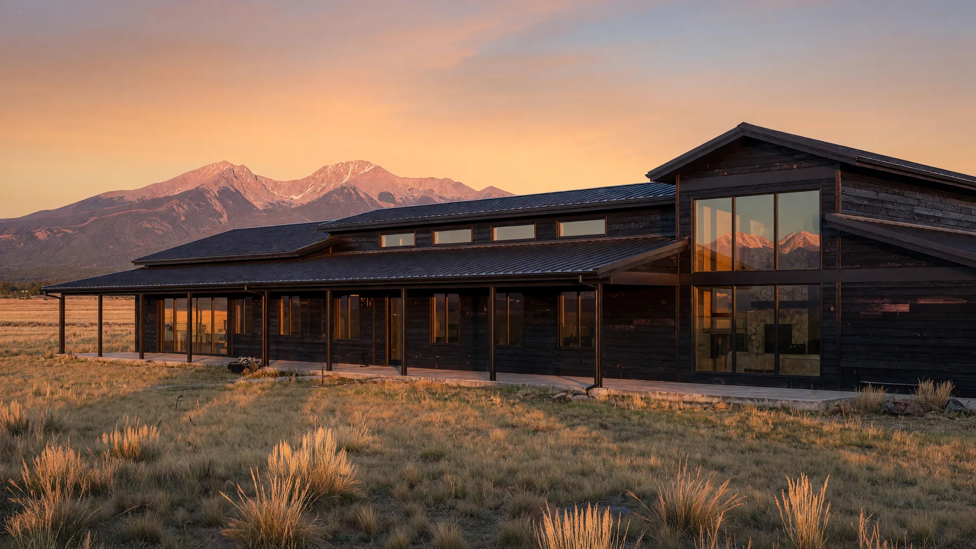 Concept rendering of a modern ranch home in a golden meadow with the San Francisco Peaks beyond