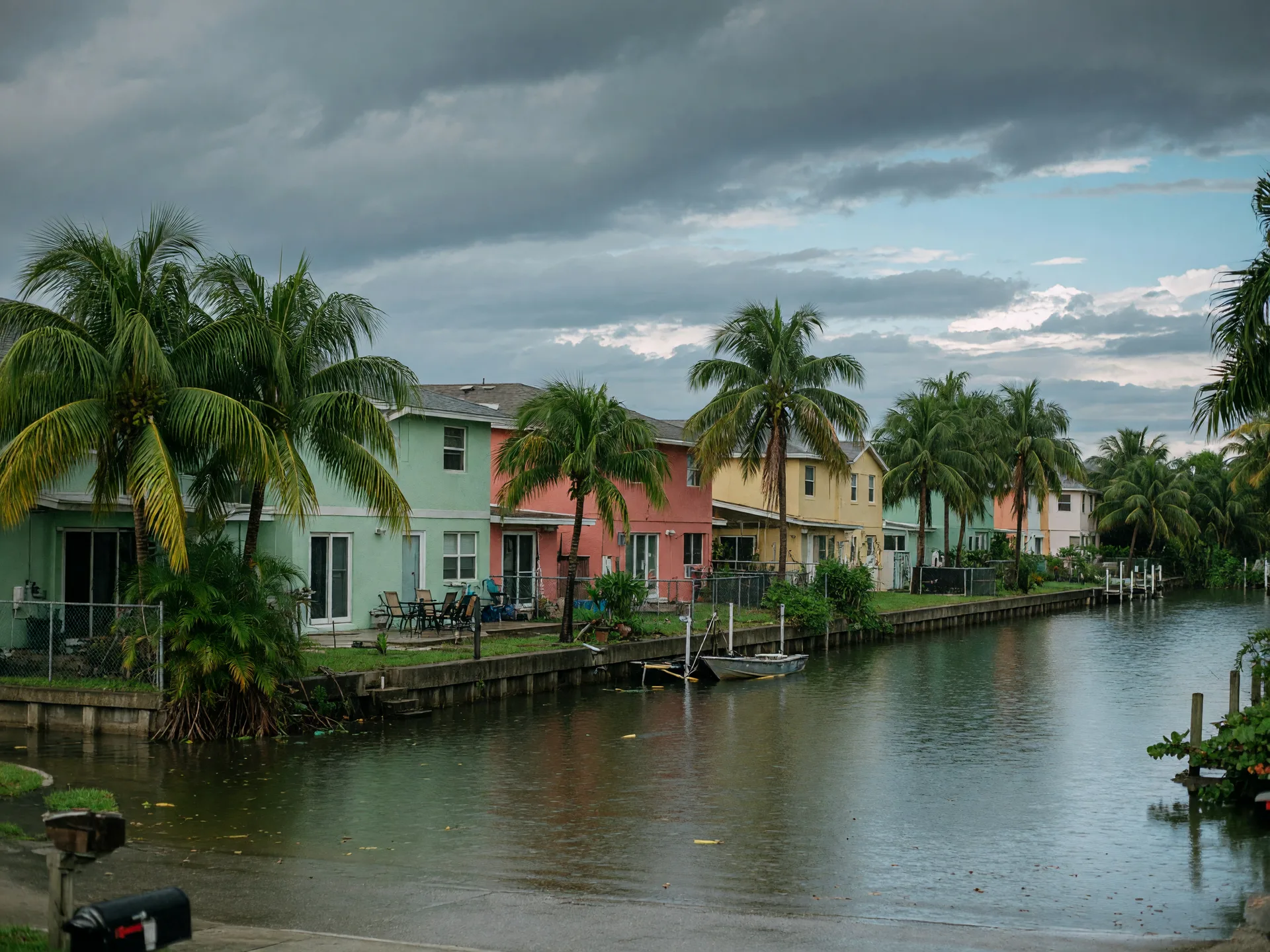 Florida canal neighborhood after a rain shower showing flood risk