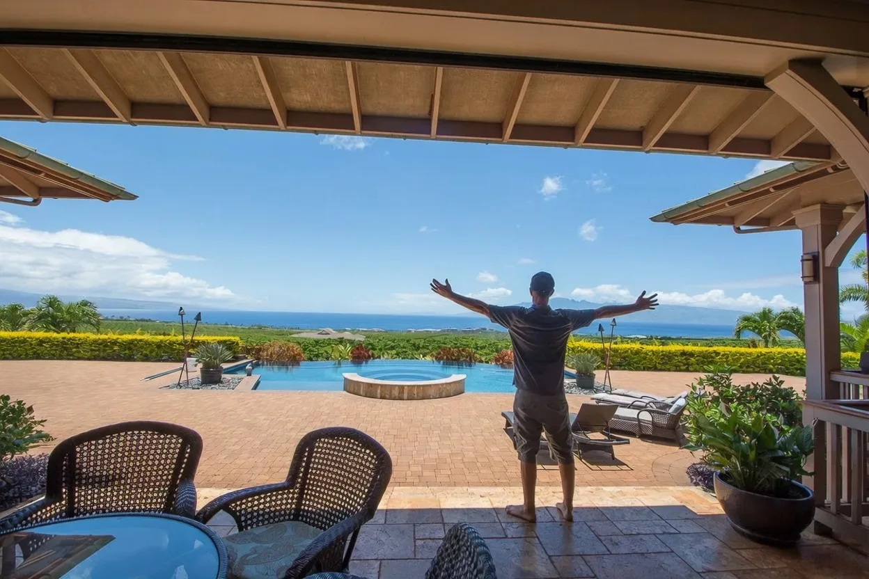 Scenic Maui coastline with turquoise ocean waves meeting golden sand
