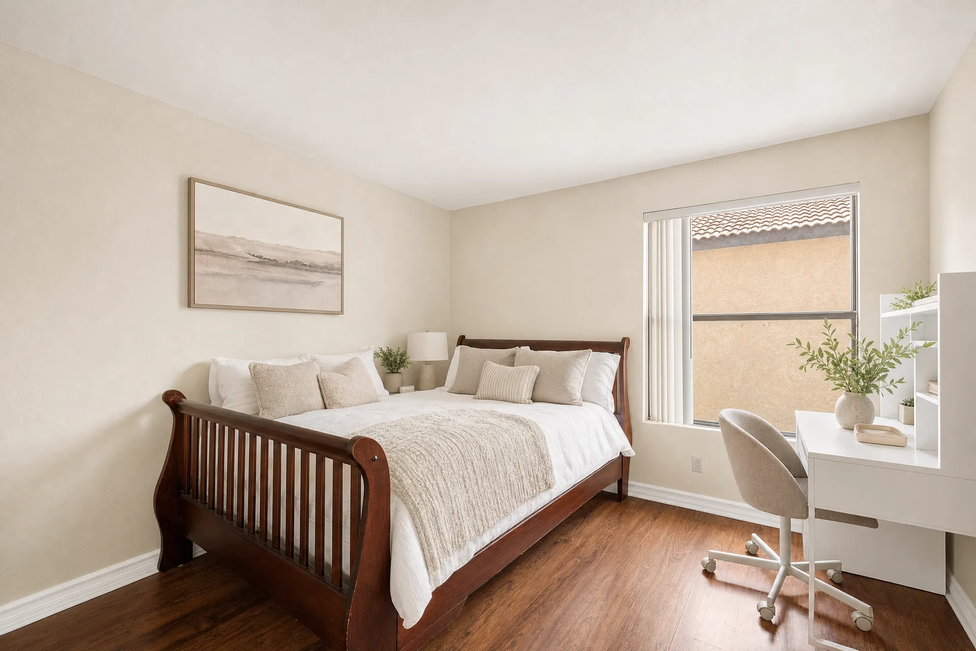 Virtually staged bedroom with neutral-painted walls and a bed