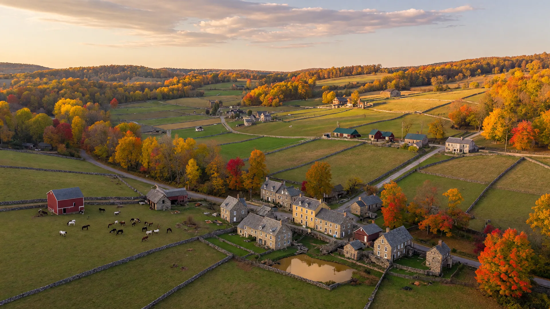 Rolling countryside and horse farms in Chester Springs, Chester County PA with autumn foliage
