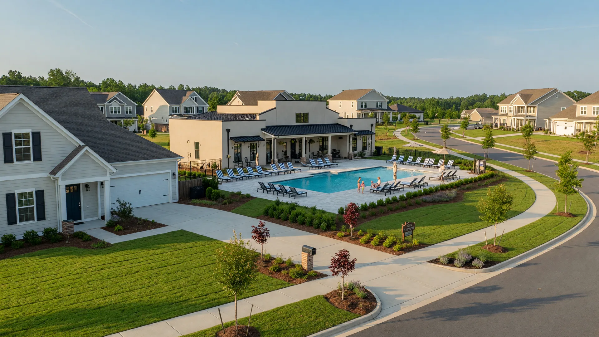 A newer single-family home, community pool, and clubhouse in the Reserve at Gold Hill community of Fort Mill, South Carolina