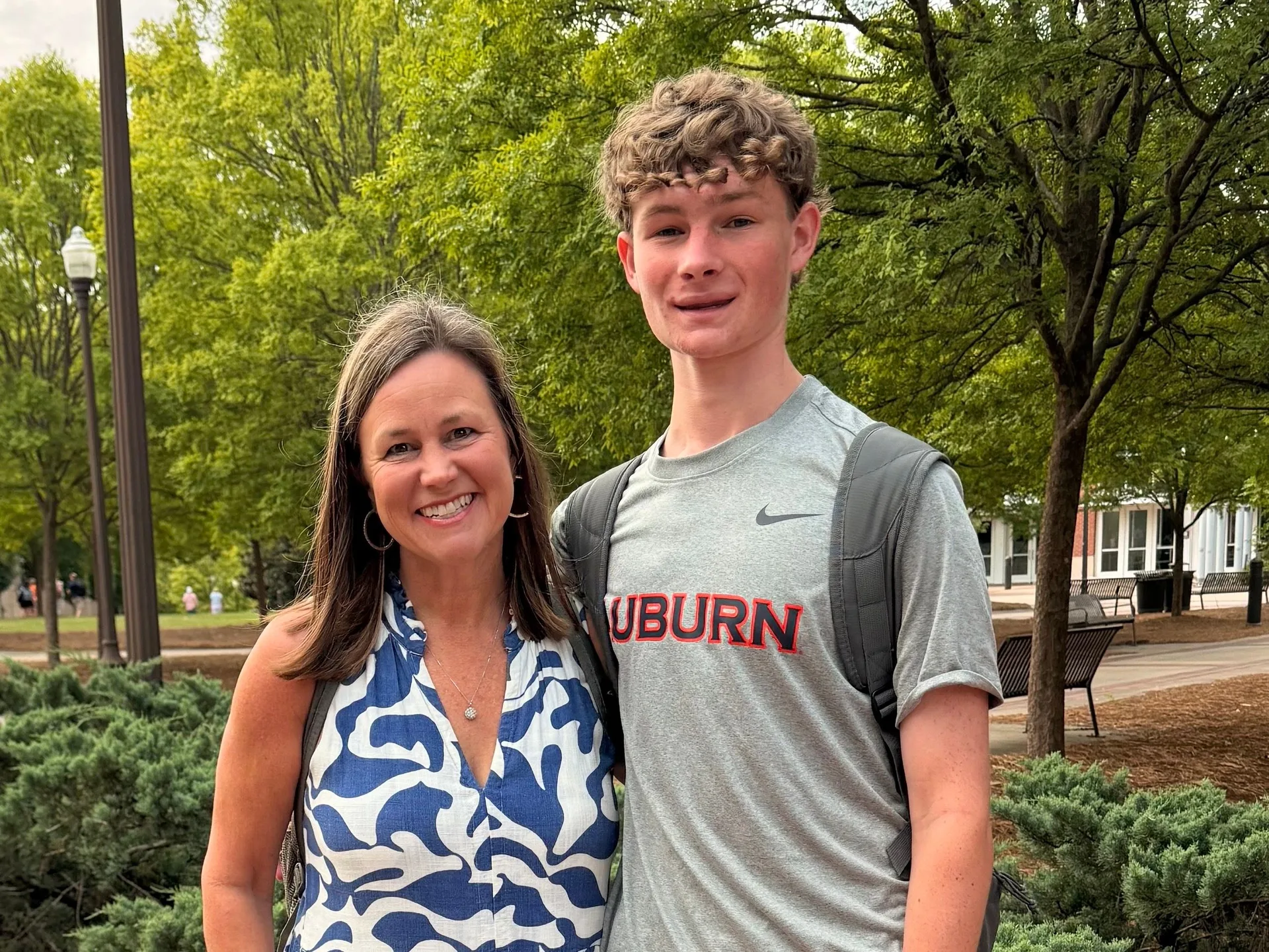 Rozi Dover with her son Caleb on the Auburn University campus