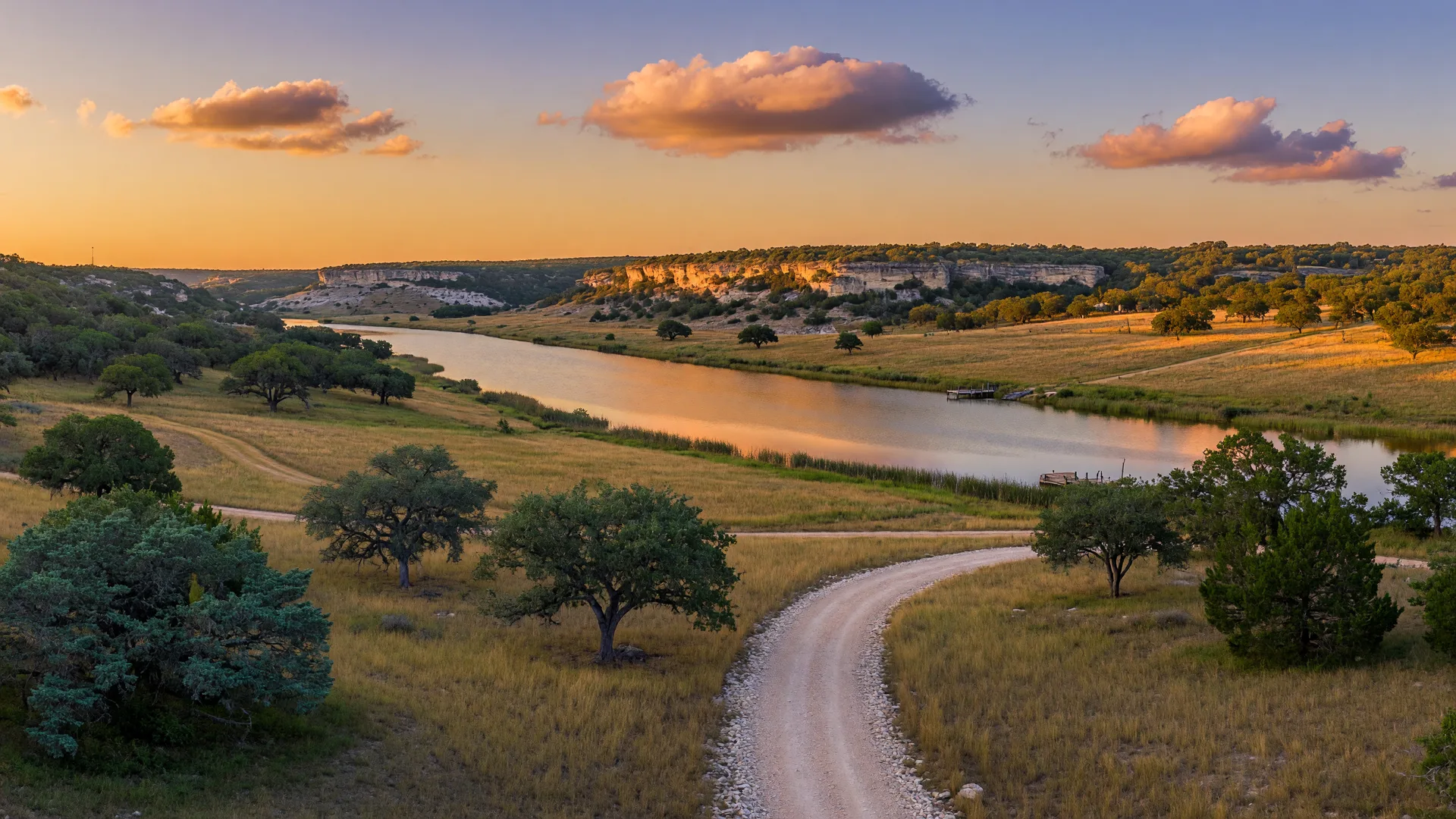 Rolling Texas Hill Country near Belton at golden hour with a lake catching the light