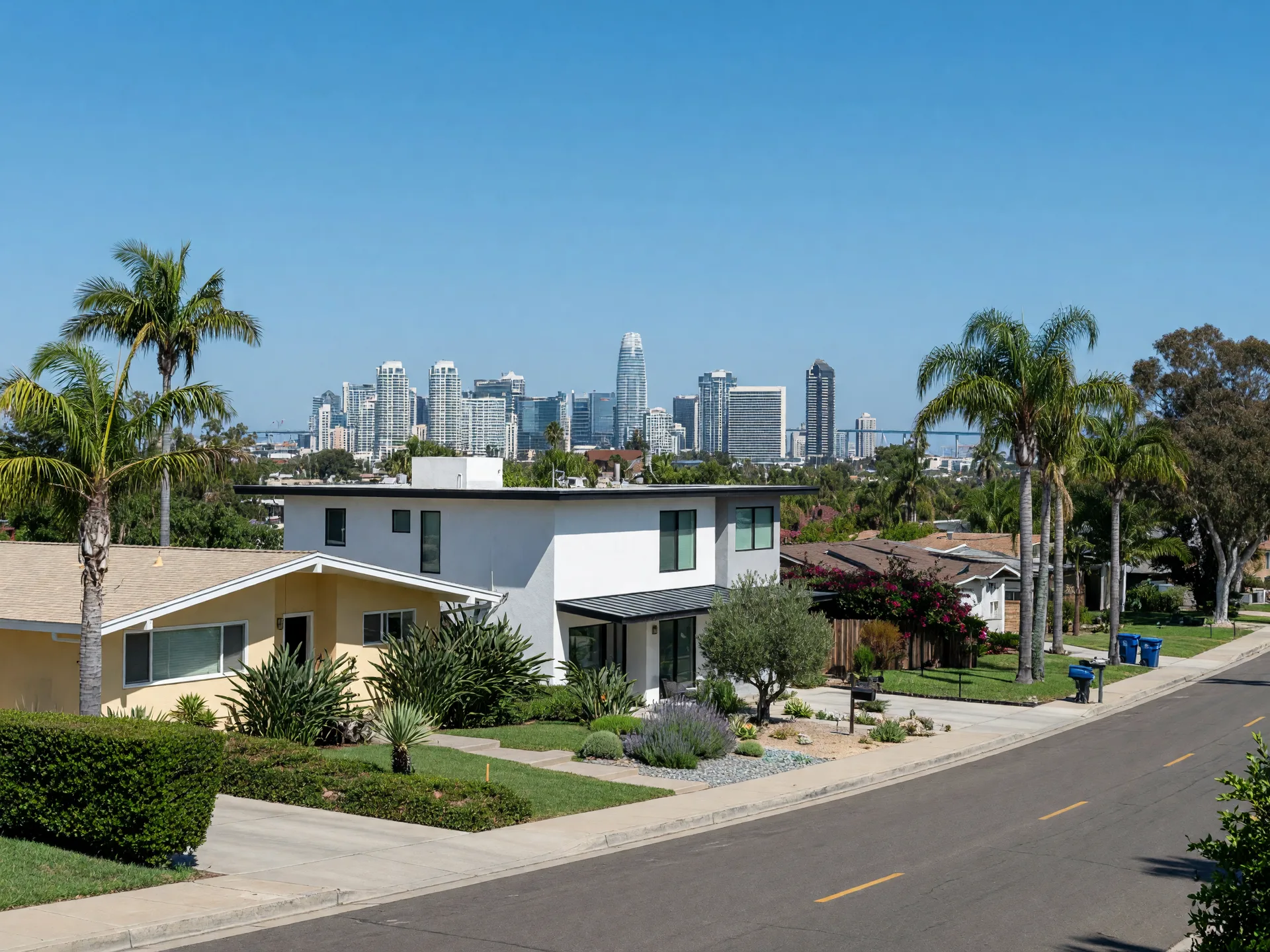 San Diego County residential neighborhood with mix of mid-century and modern homes and downtown skyline in the distance