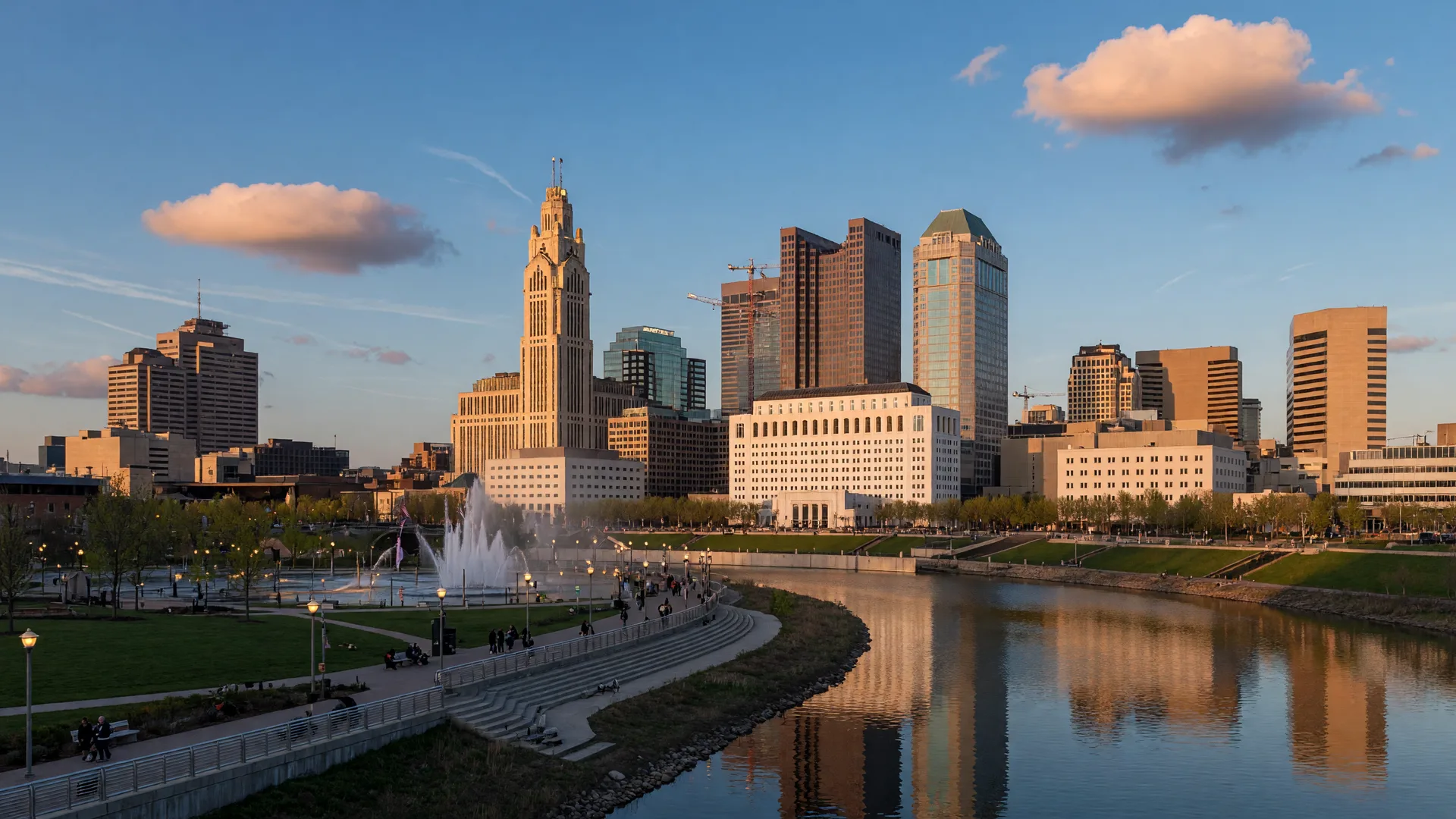 Columbus downtown skyline with the LeVeque Tower and Scioto Mile riverfront at golden hour, Ohio's capital city