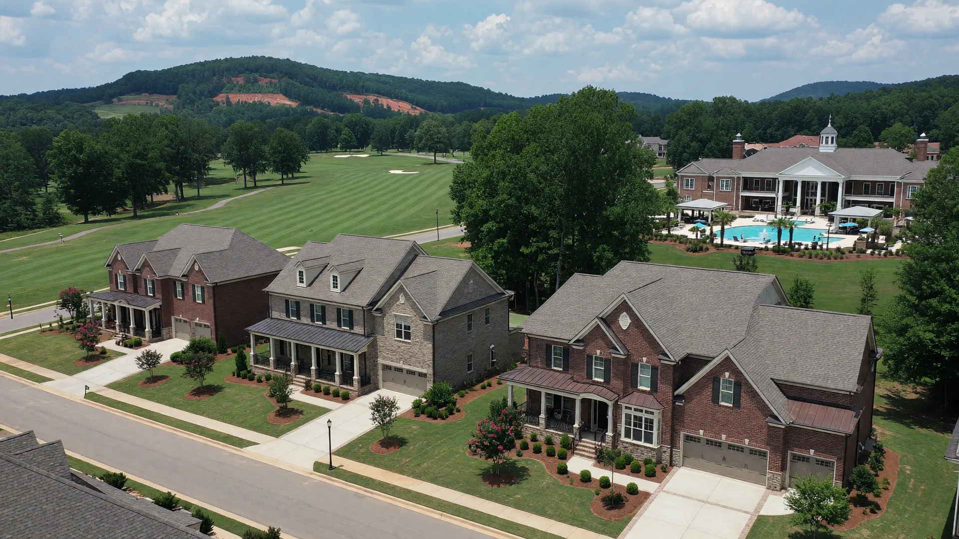 New construction upscale homes in the Hoover area with Ross Bridge-style architecture and rolling Piedmont terrain