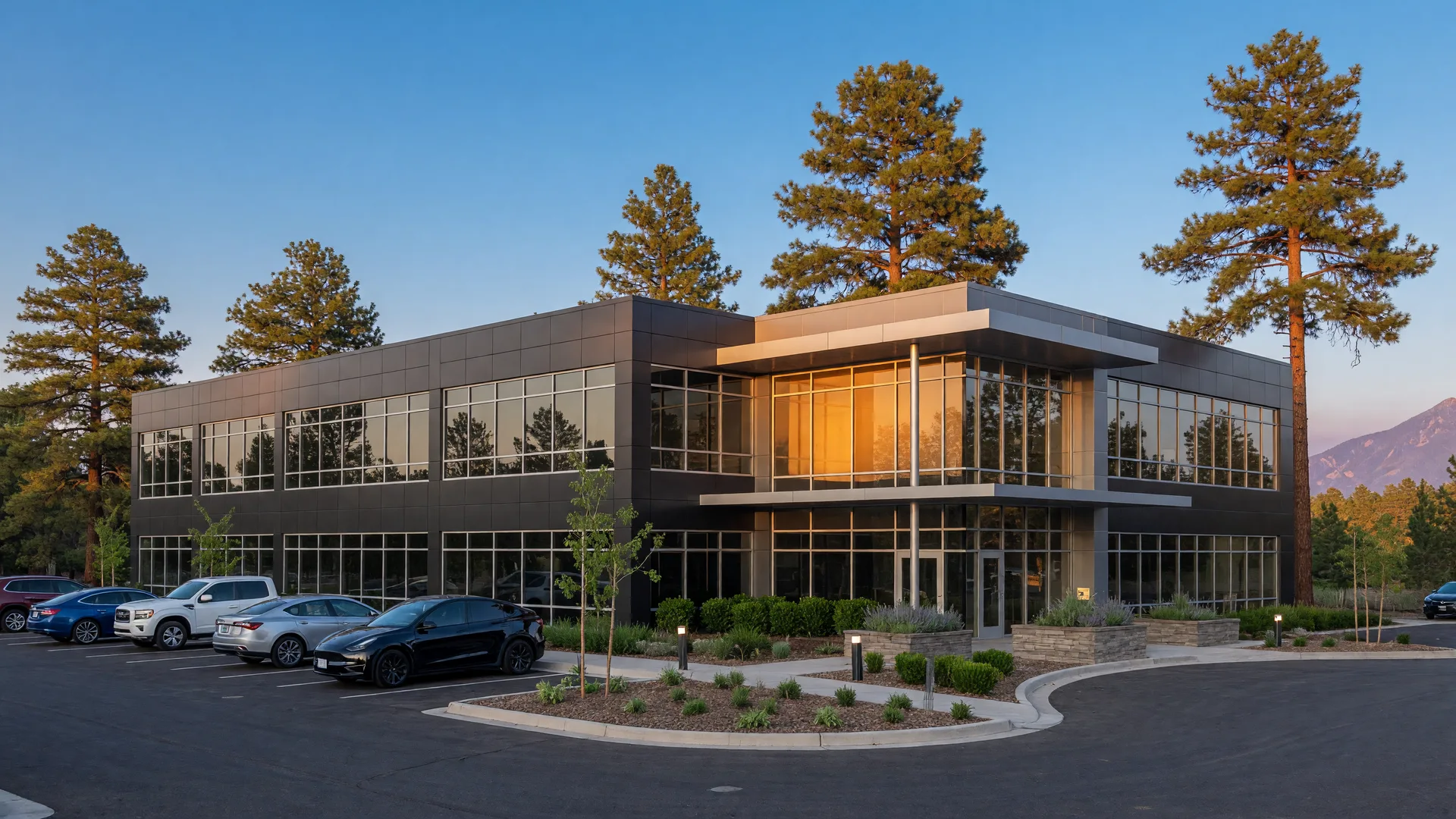 Modern commercial building exterior in Flagstaff Arizona with professional architecture, glass windows, and landscaped entrance