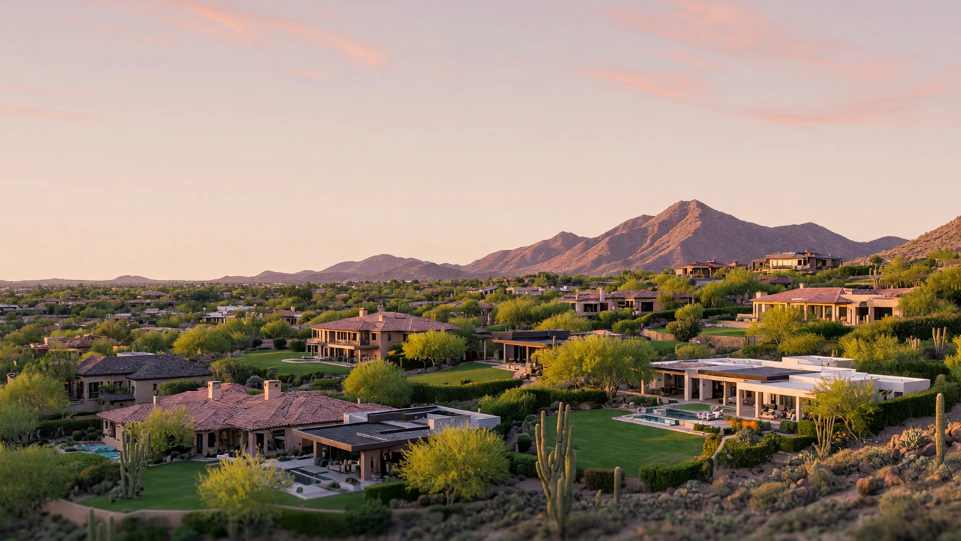 Luxury estates in Paradise Valley toward Camelback Mountain at late afternoon