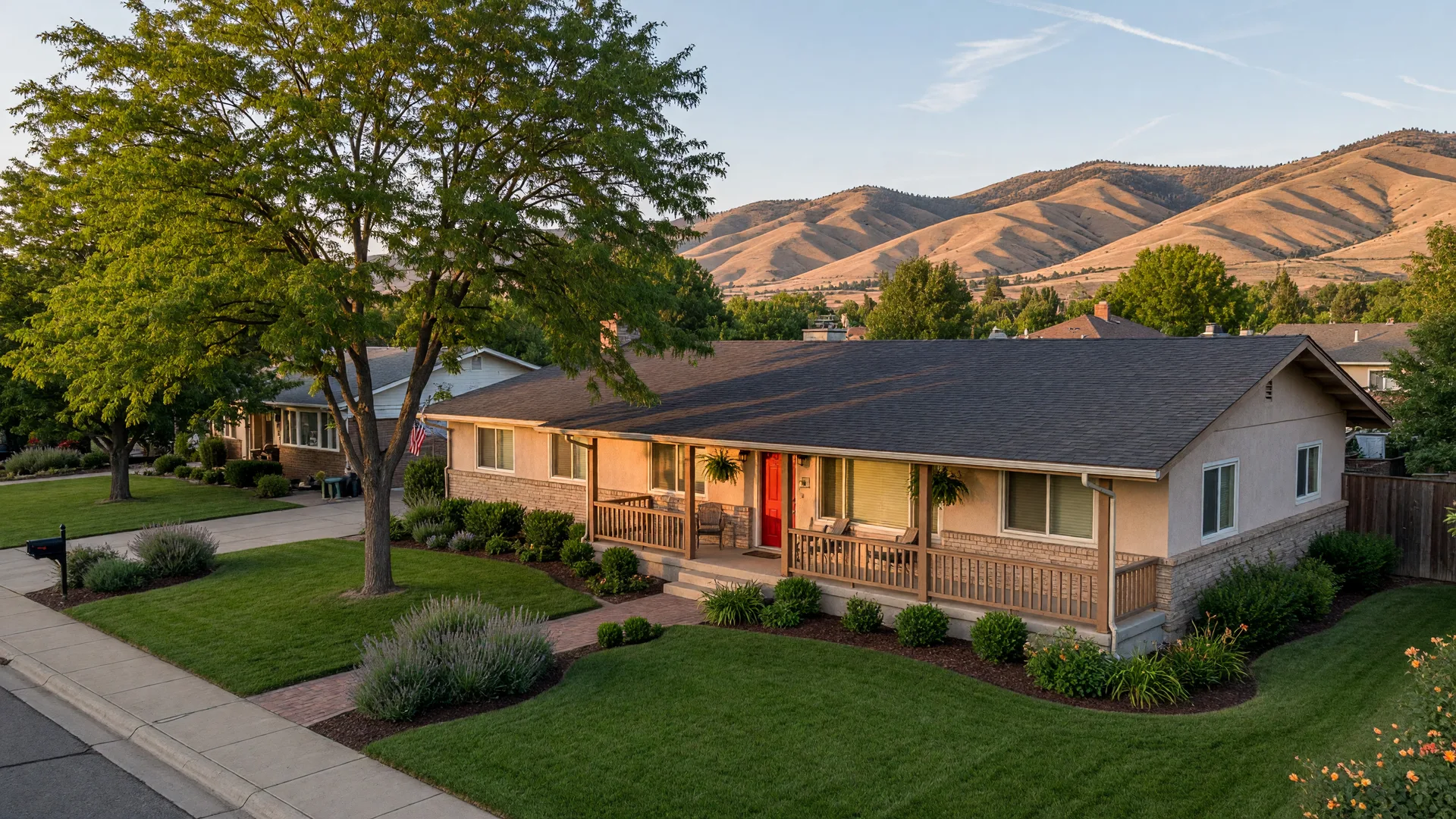 A single-story ranch-style home on a tree-lined street in the Boise area