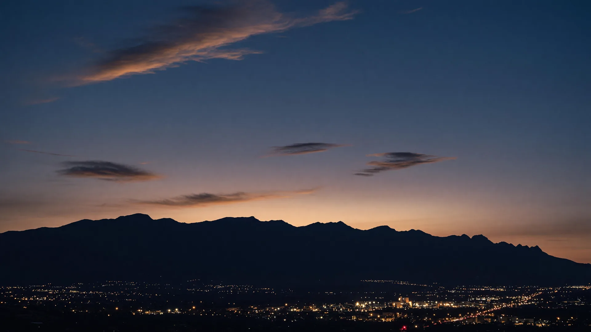 The Sandia Mountains at dusk, looking over Albuquerque