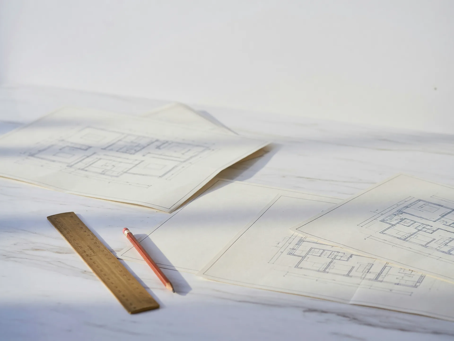 Architectural blueprints and floor plans for custom home design