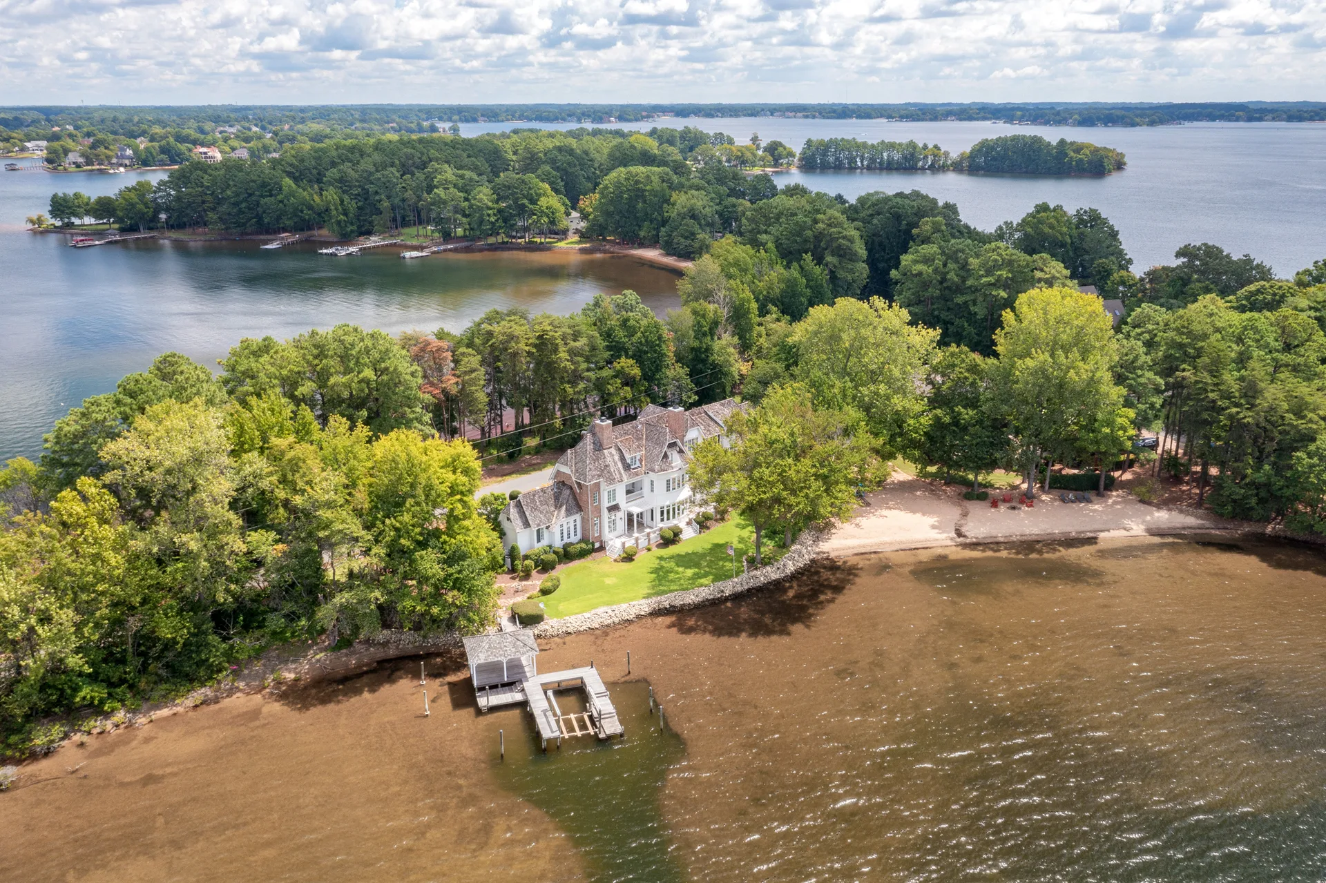 Aerial view of 17831 Mollypop Lane, a waterfront estate on a private peninsula of Lake Norman, Cornelius NC