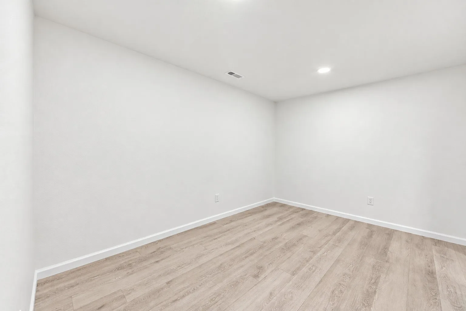 The family room unfurnished and empty, ready for its next owner