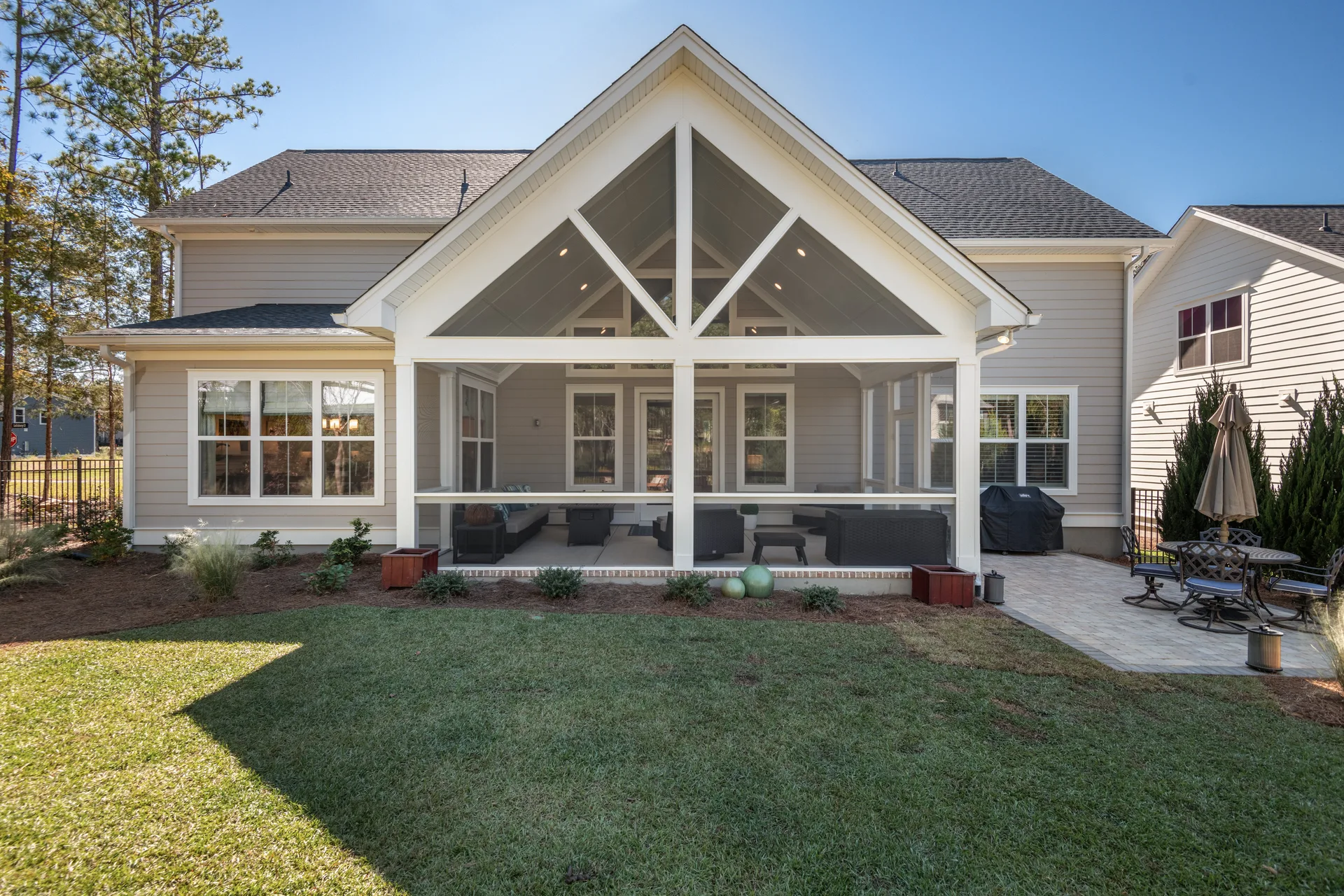 Rear of the home with the screened porch