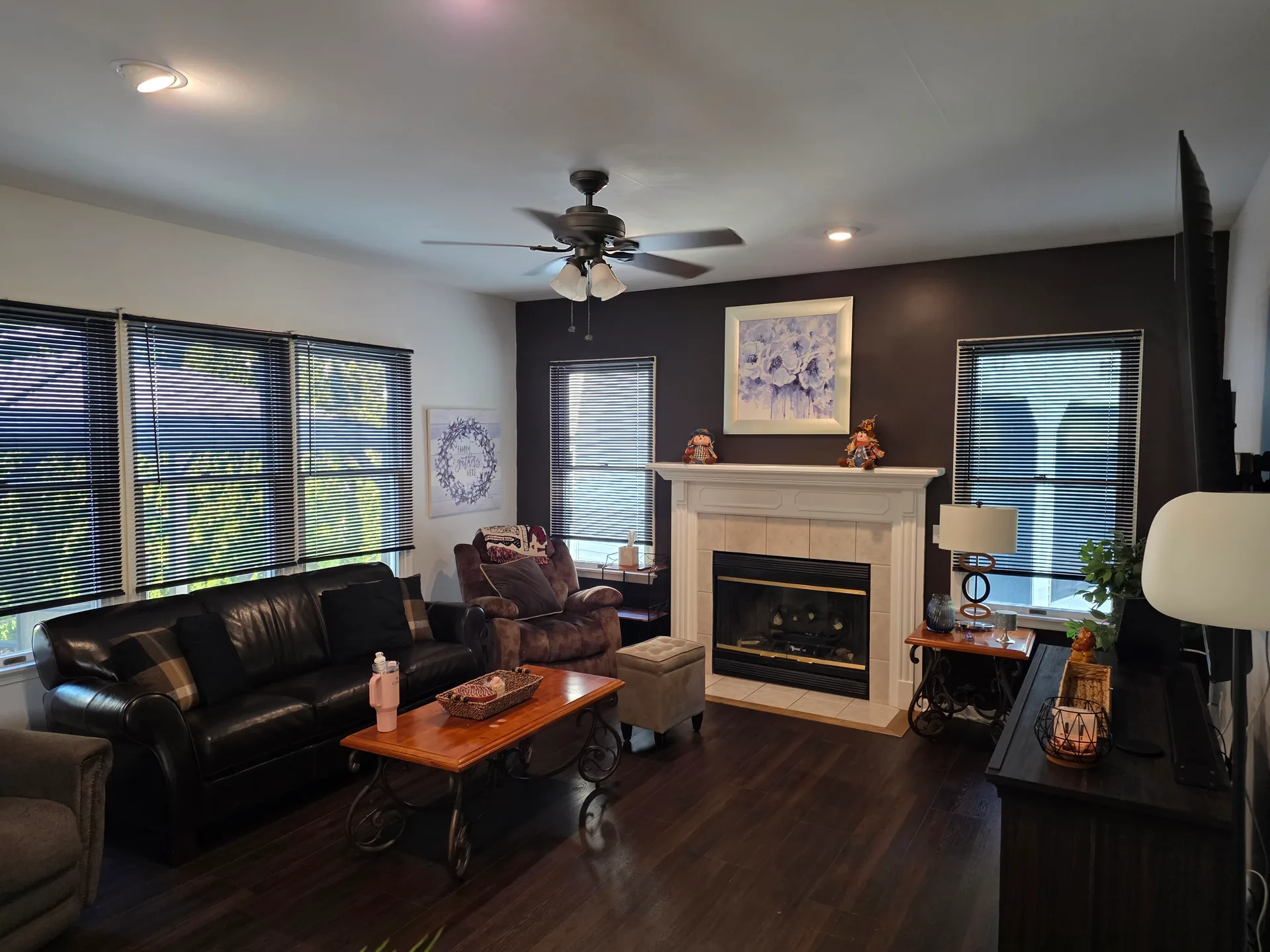 Family room with gas fireplace open to the kitchen at 1906 Grouse Court, Forks Township PA