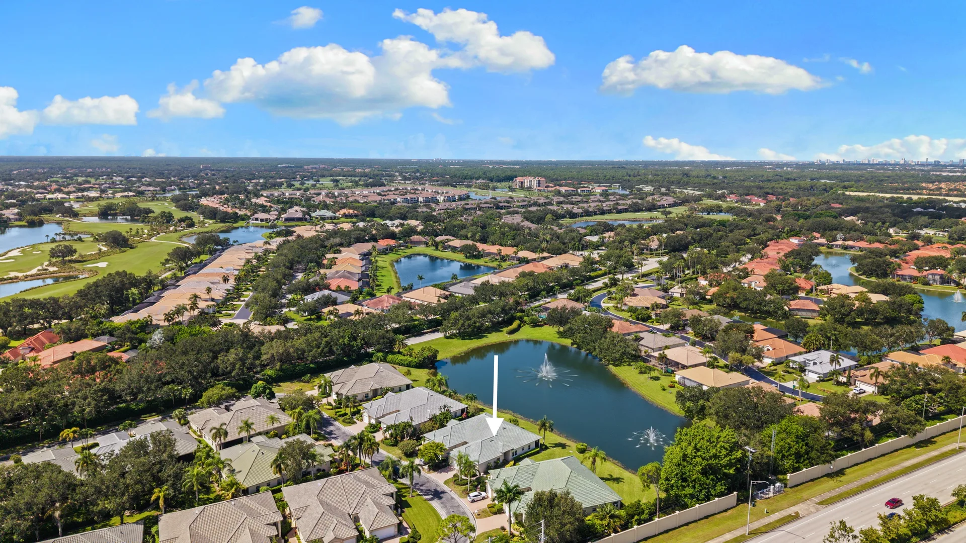 Aerial of community with golf course surroundings