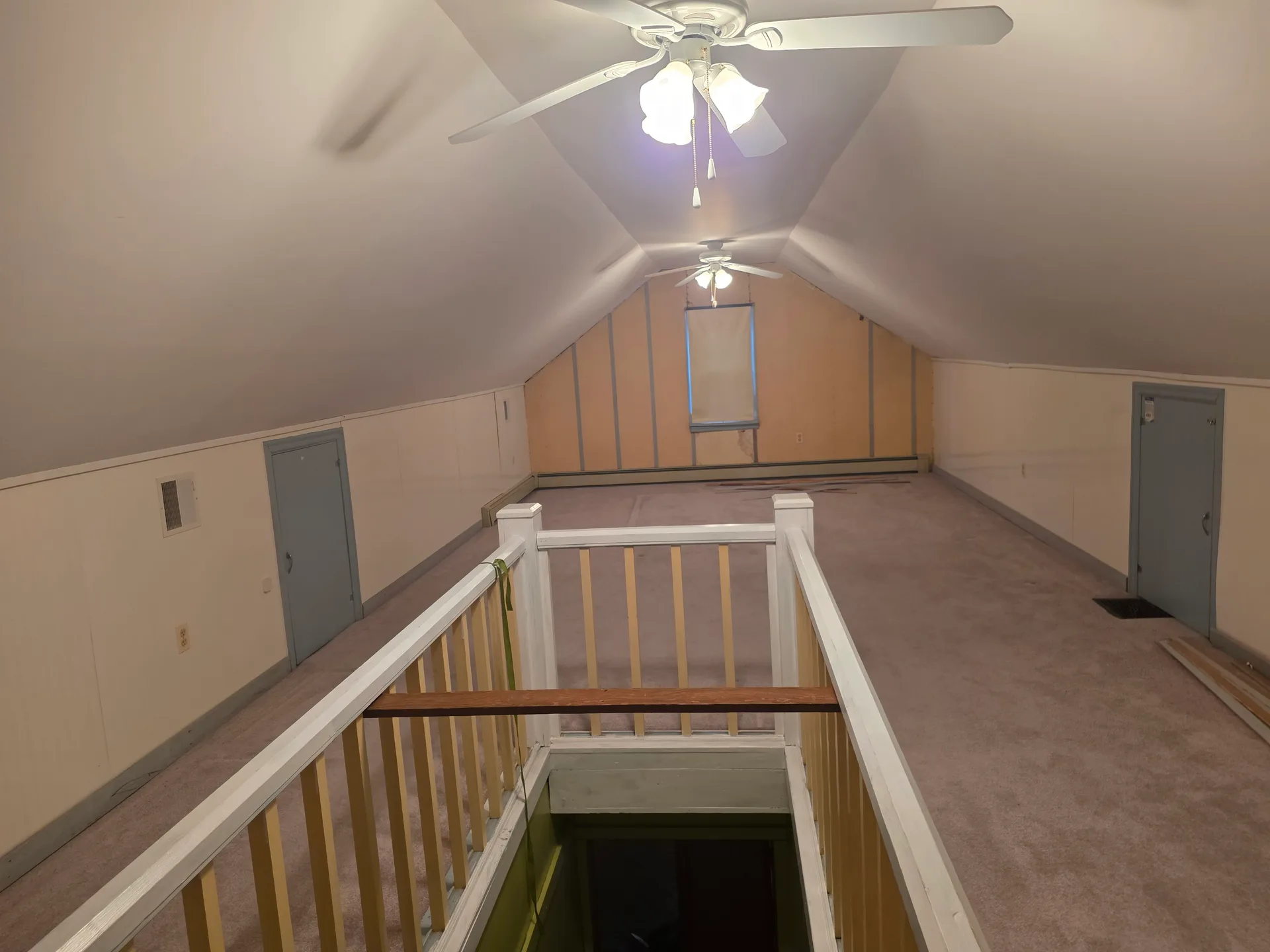 Attic bedroom with sloped ceilings