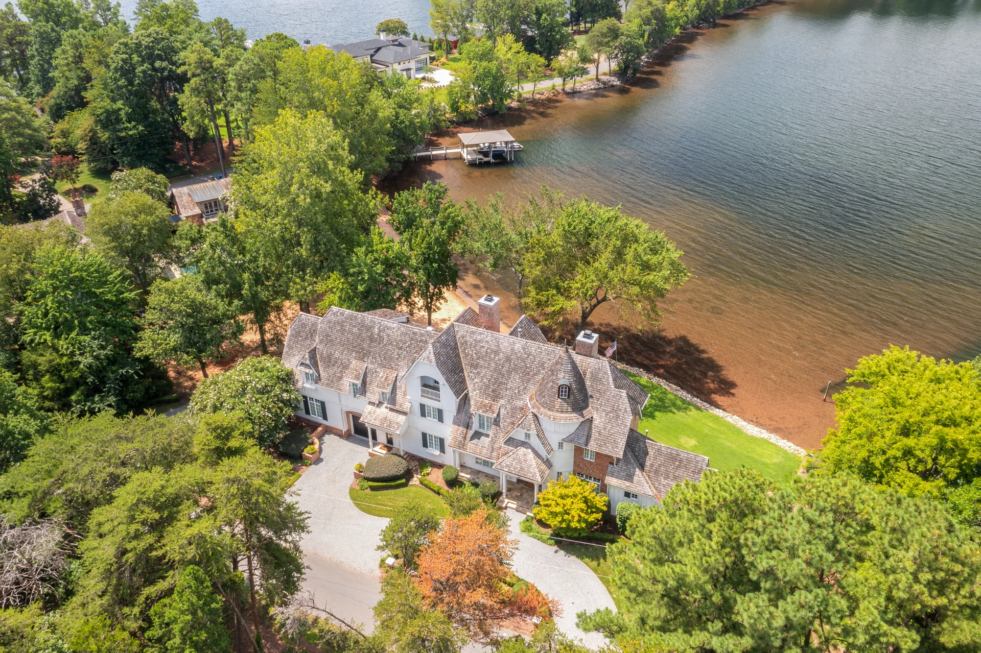 Wide aerial view of waterfront estate on Lake Norman with long-range water views