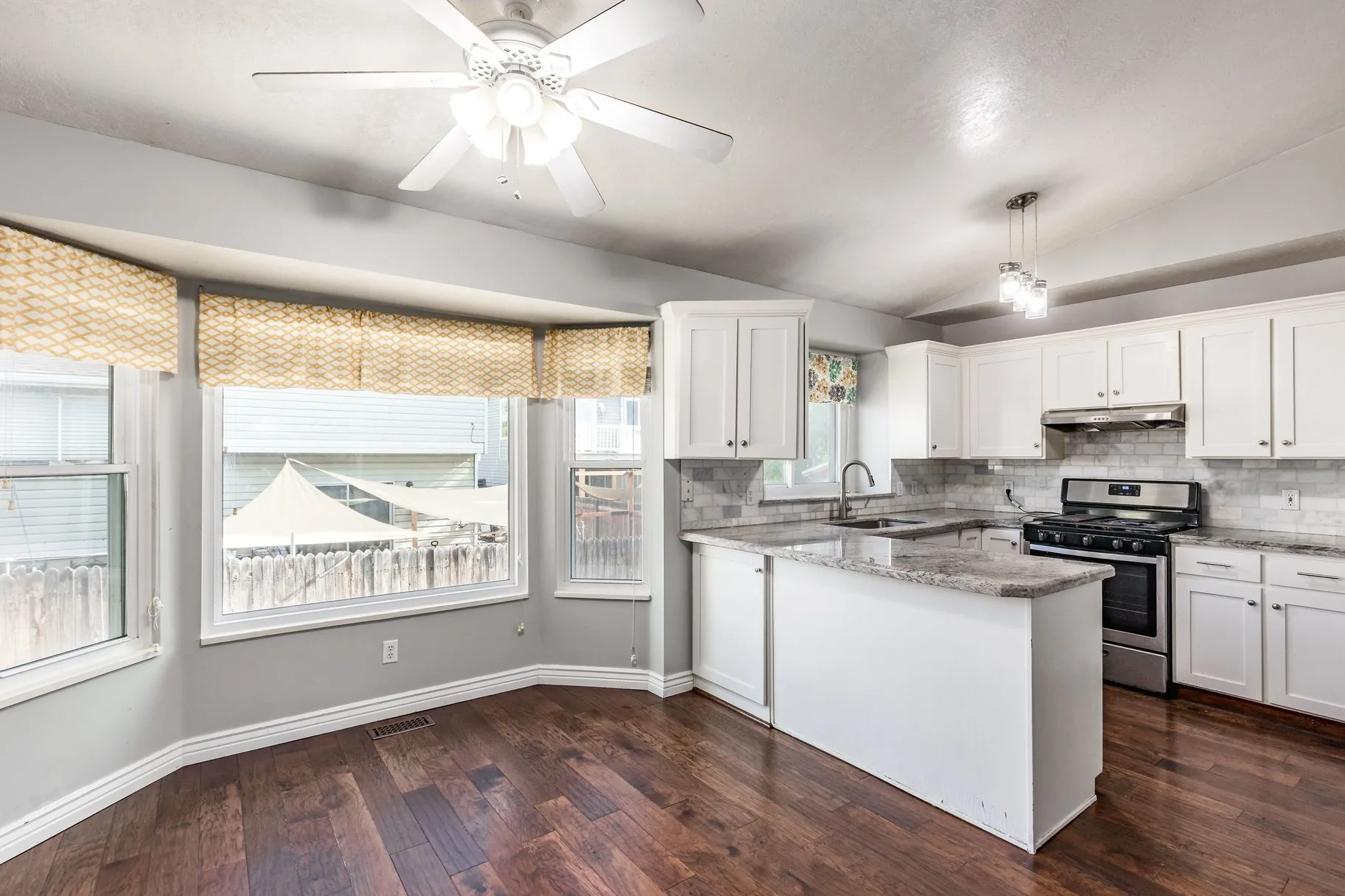 Kitchen dining nook with pendant lights
