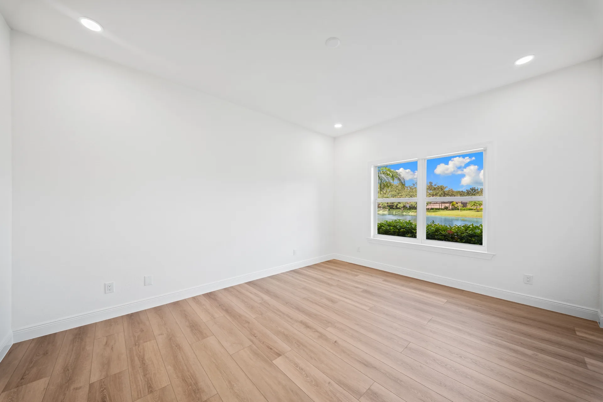 Bedroom with lake view through the window