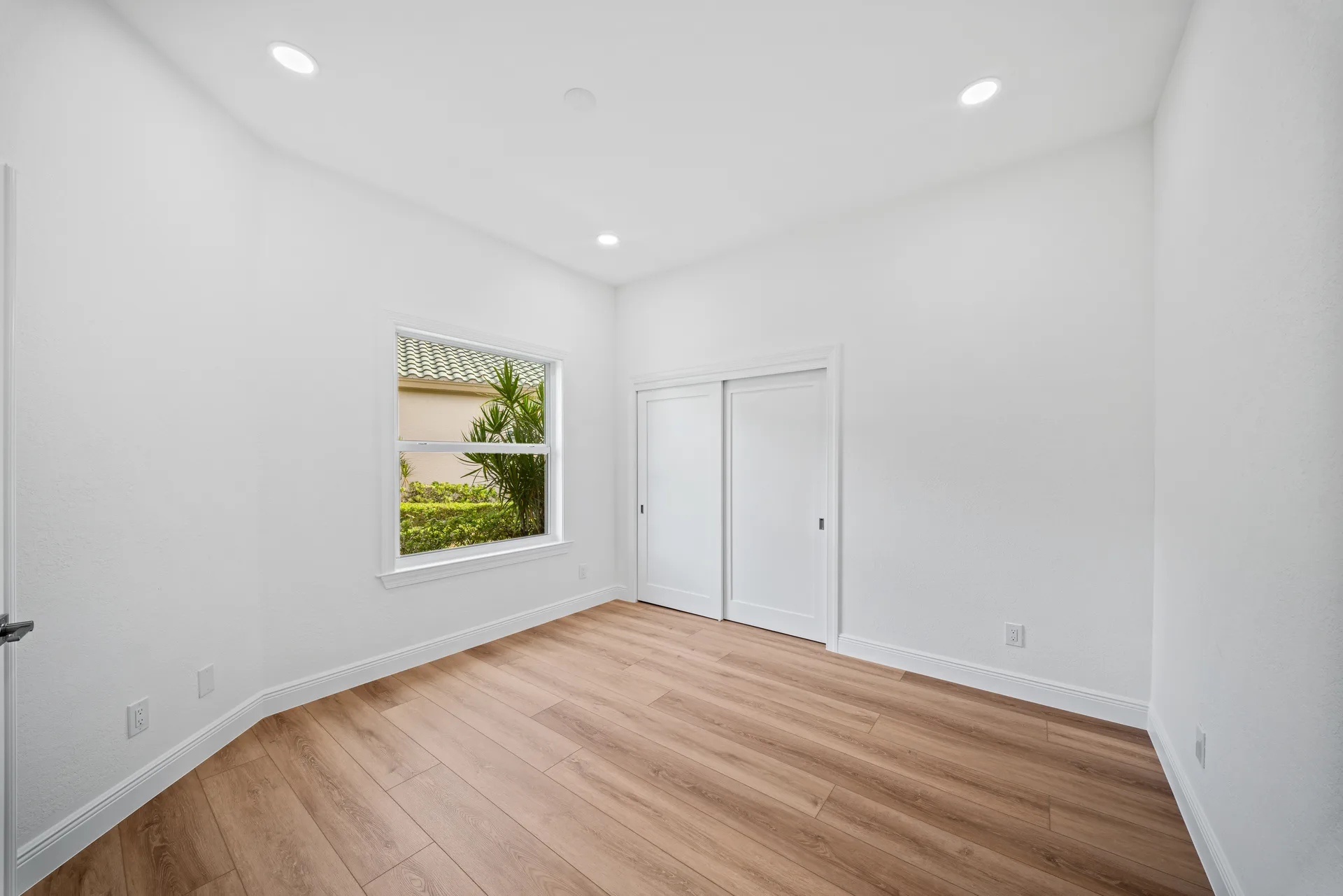 Vacant bedroom with natural lighting