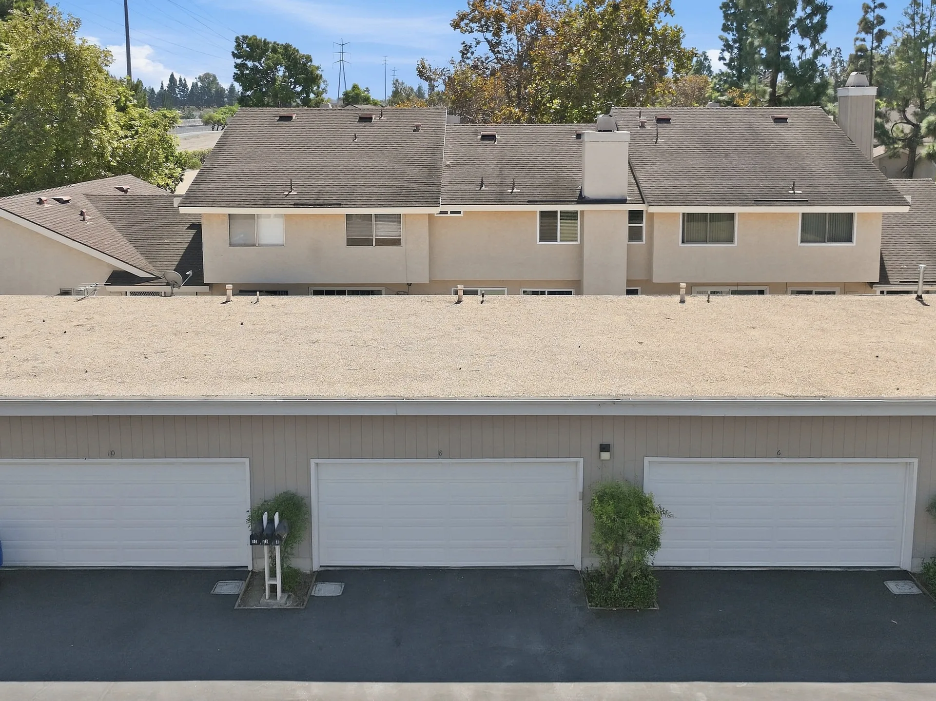 Aerial view of the 8 Silverwood residence and its attached garages in Irvine