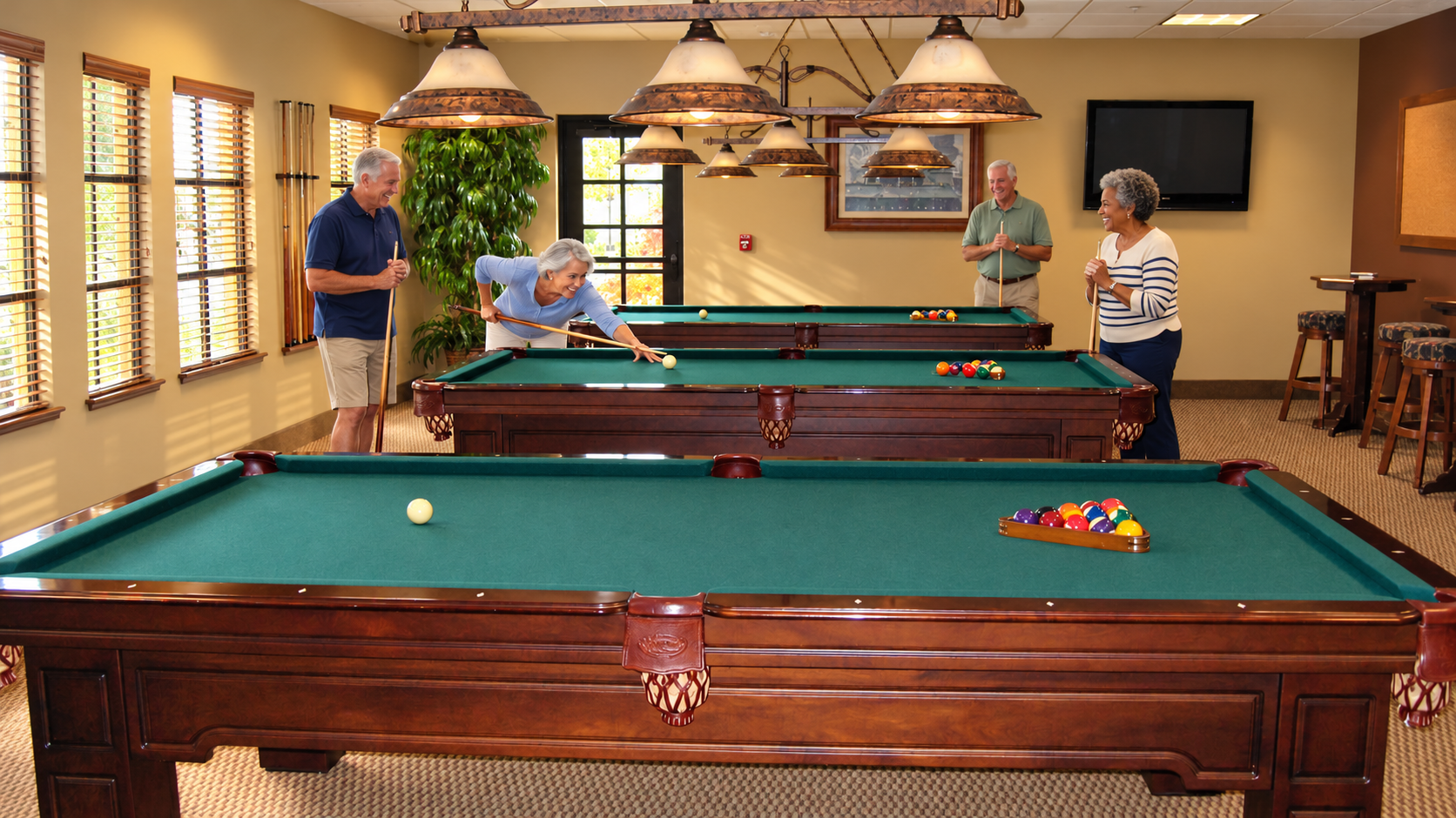 The sunlit billiards room at Four Seasons at Westshore, the 55+ active-adult community in Sacramento, California