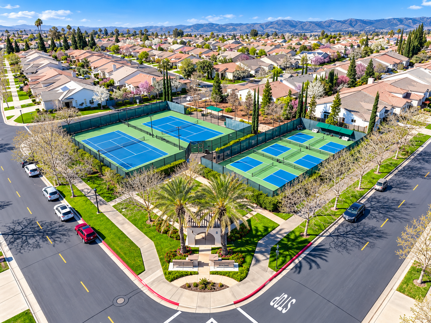 An aerial view of the tennis and pickleball courts at Heritage Park, the 55+ active-adult community in Sacramento, California