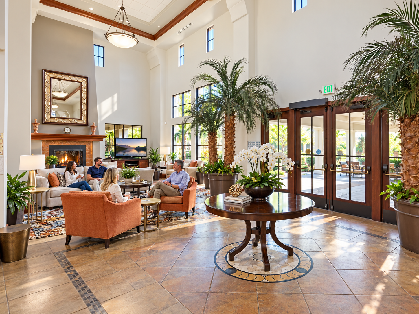 The clubhouse main lobby with palm trees at Heritage Park, the 55+ active-adult community in Sacramento, California