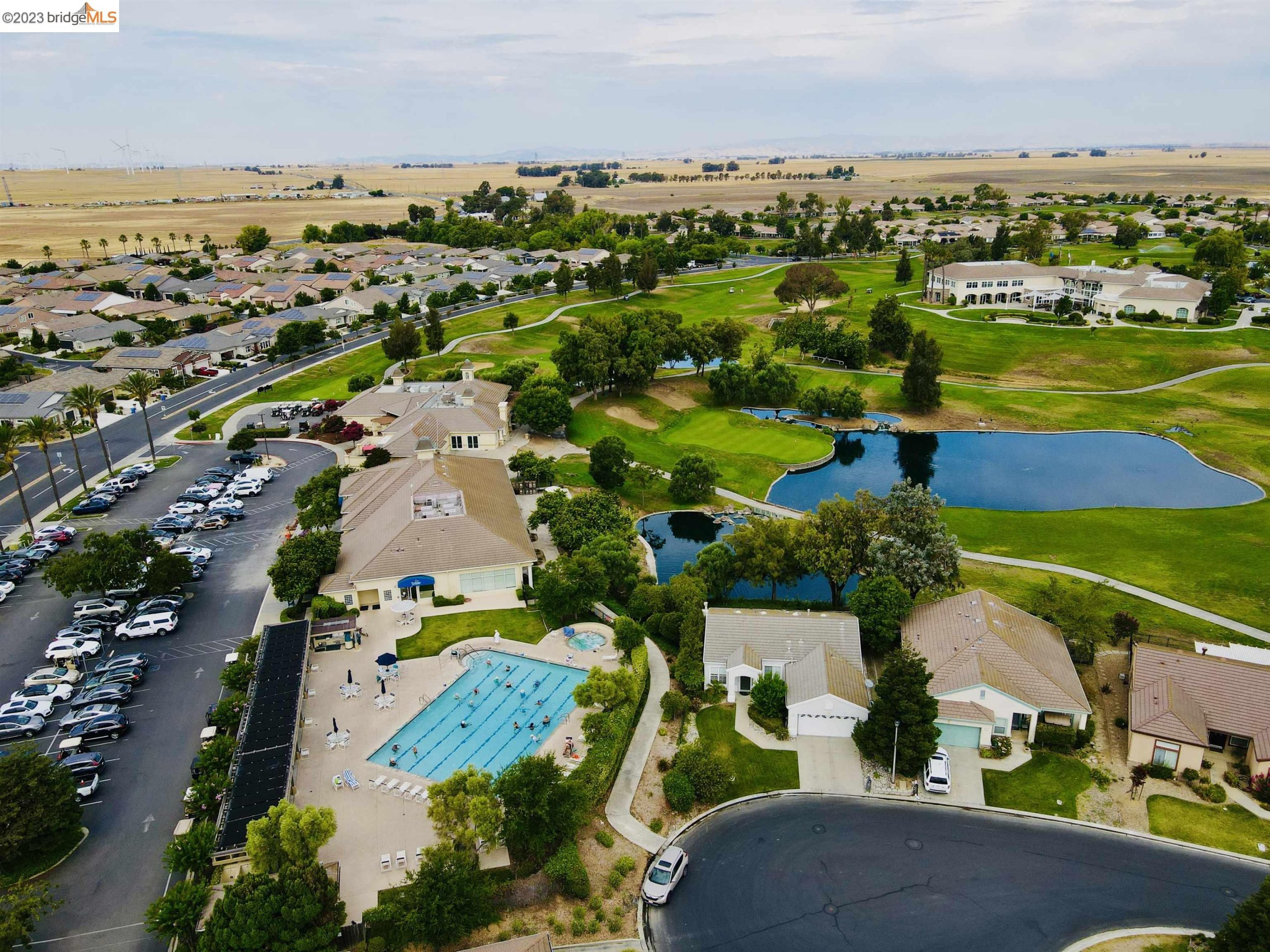 A drone view of the clubhouse and golf course at Trilogy Rio Vista, the 55+ active-adult community in Rio Vista, California