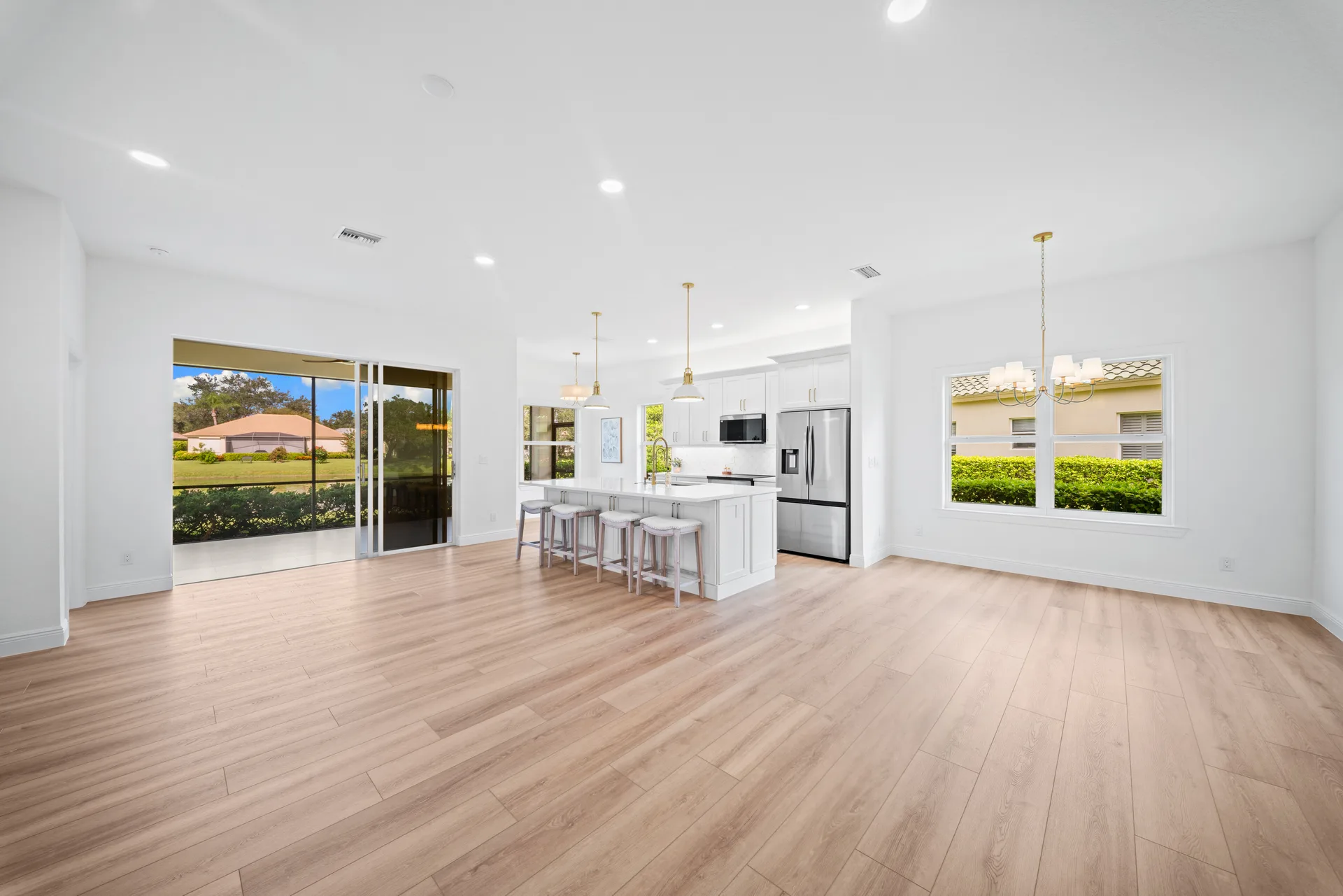 Open-concept kitchen and living area from another angle