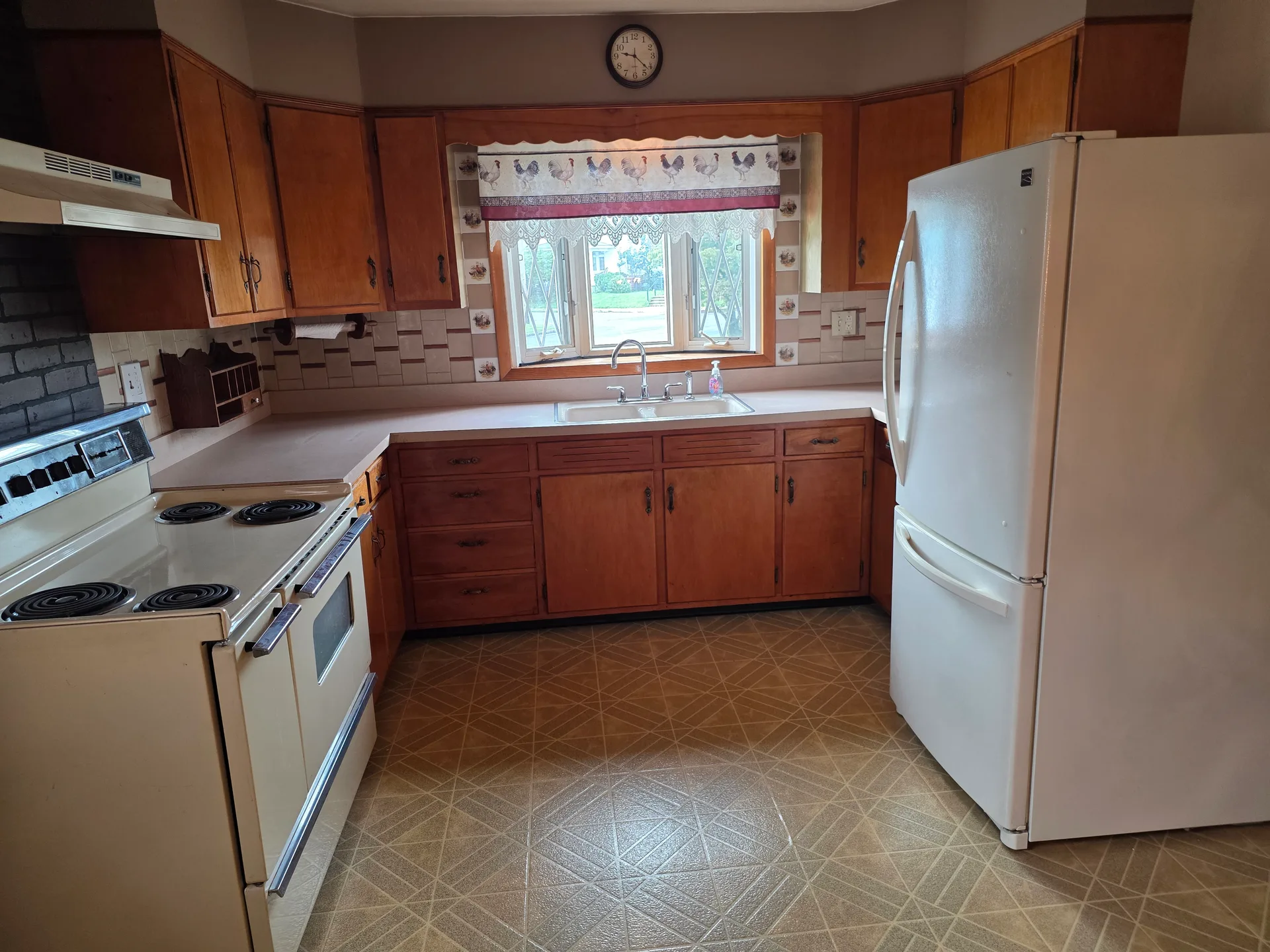 Kitchen with wood cabinetry
