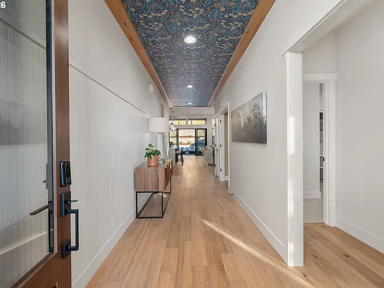 Entry: Patterned ceiling millwork frames the light court