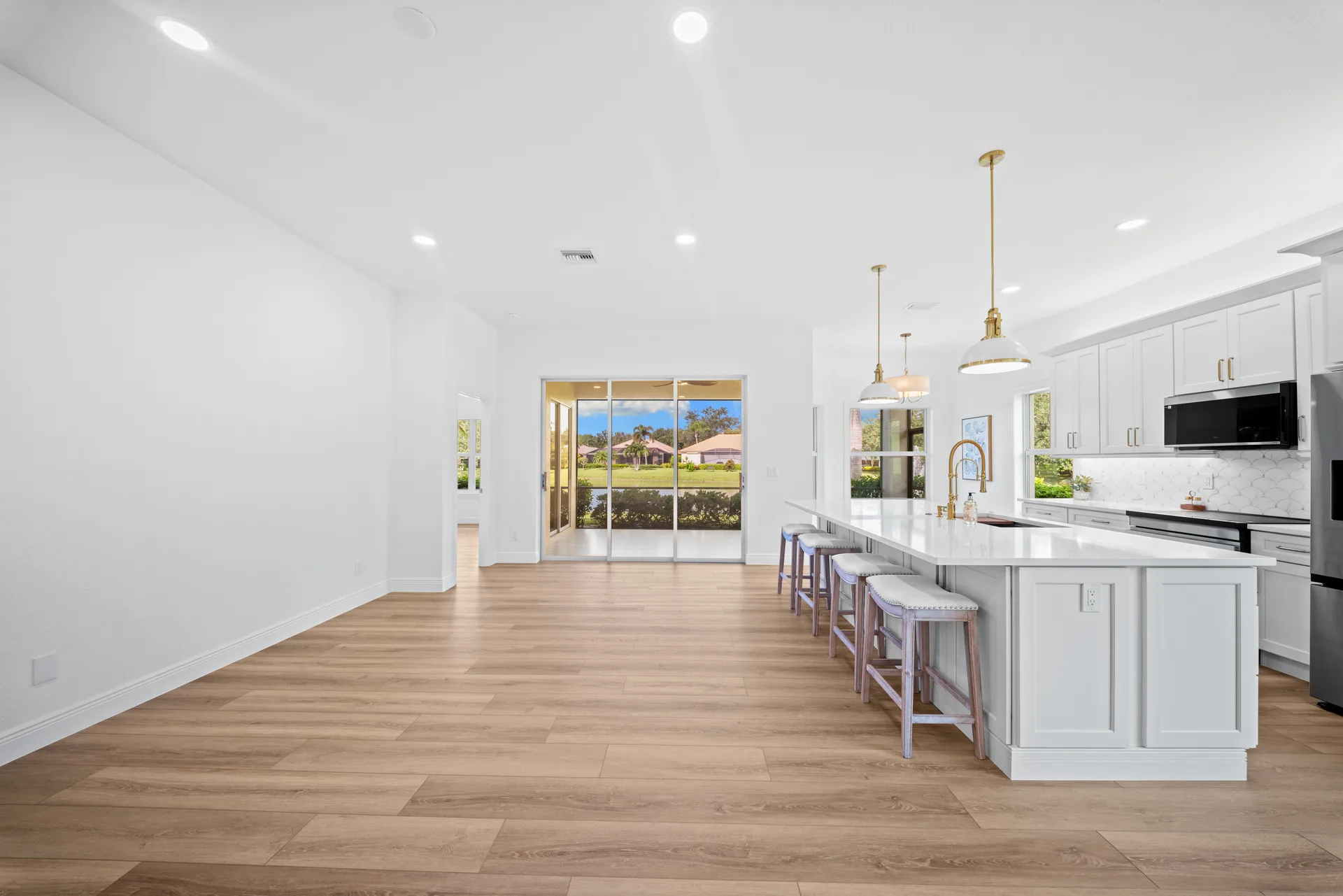Kitchen with lake view and brass accents