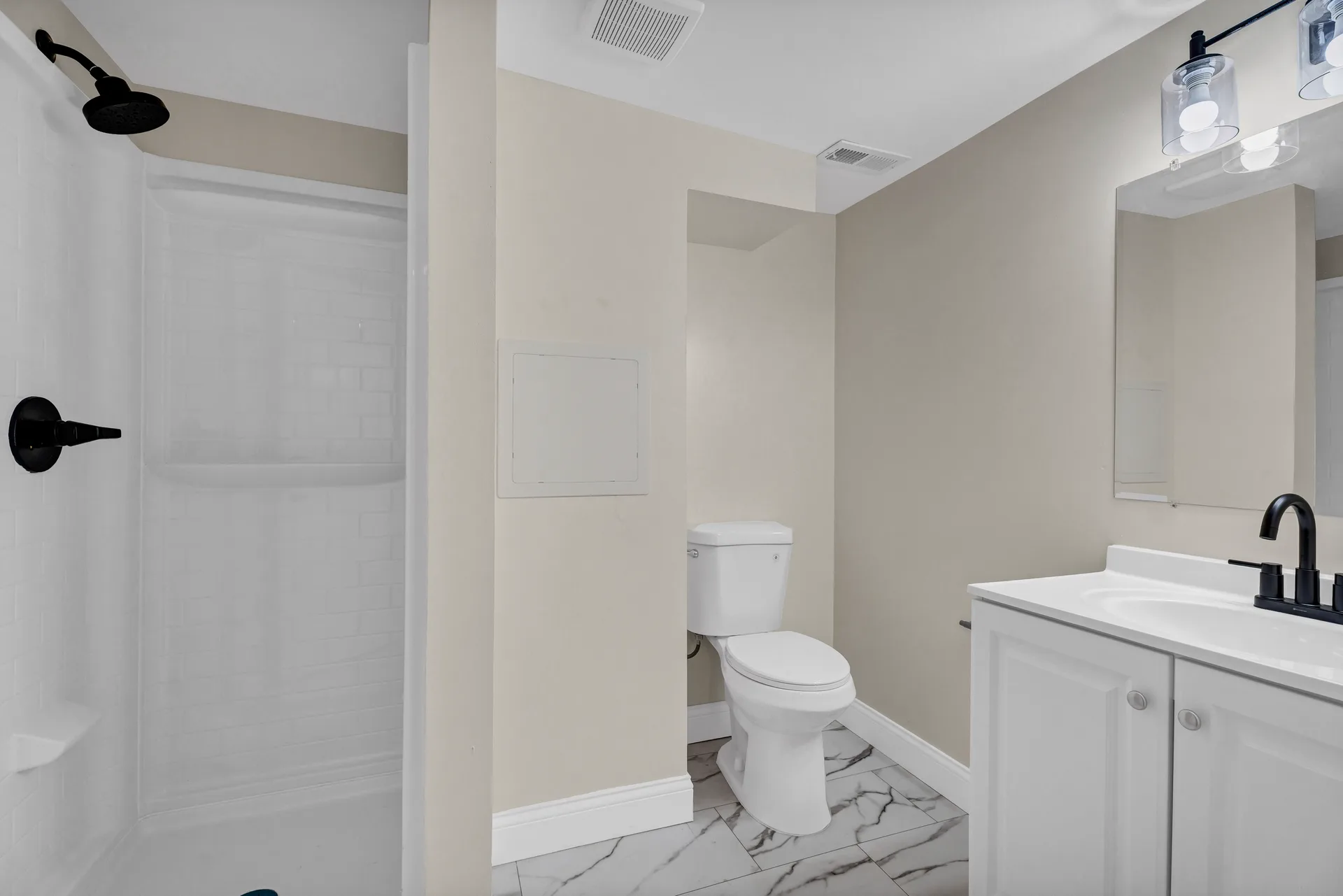 Renovated bathroom with tub/shower combo
