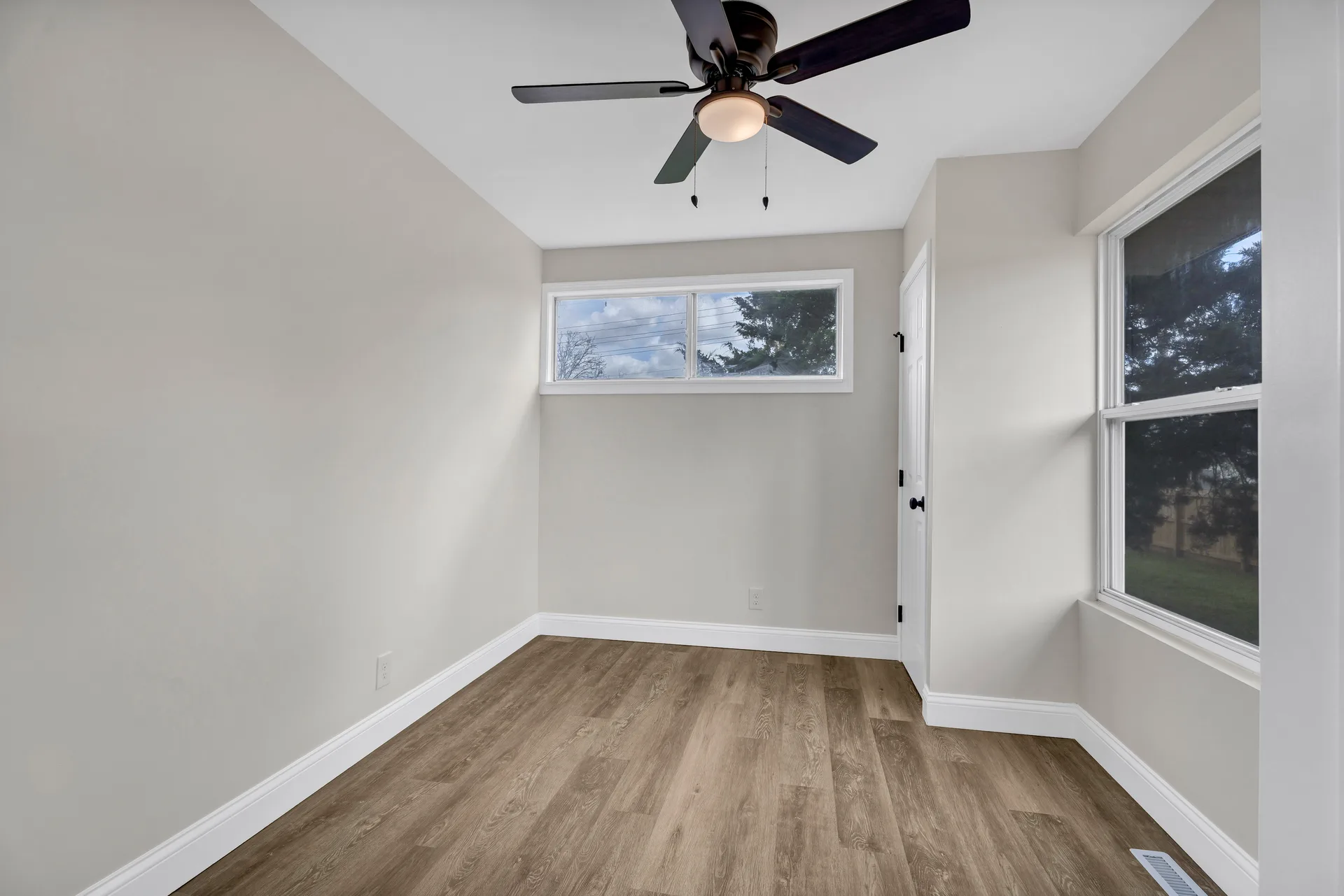 Third bedroom with natural daylight