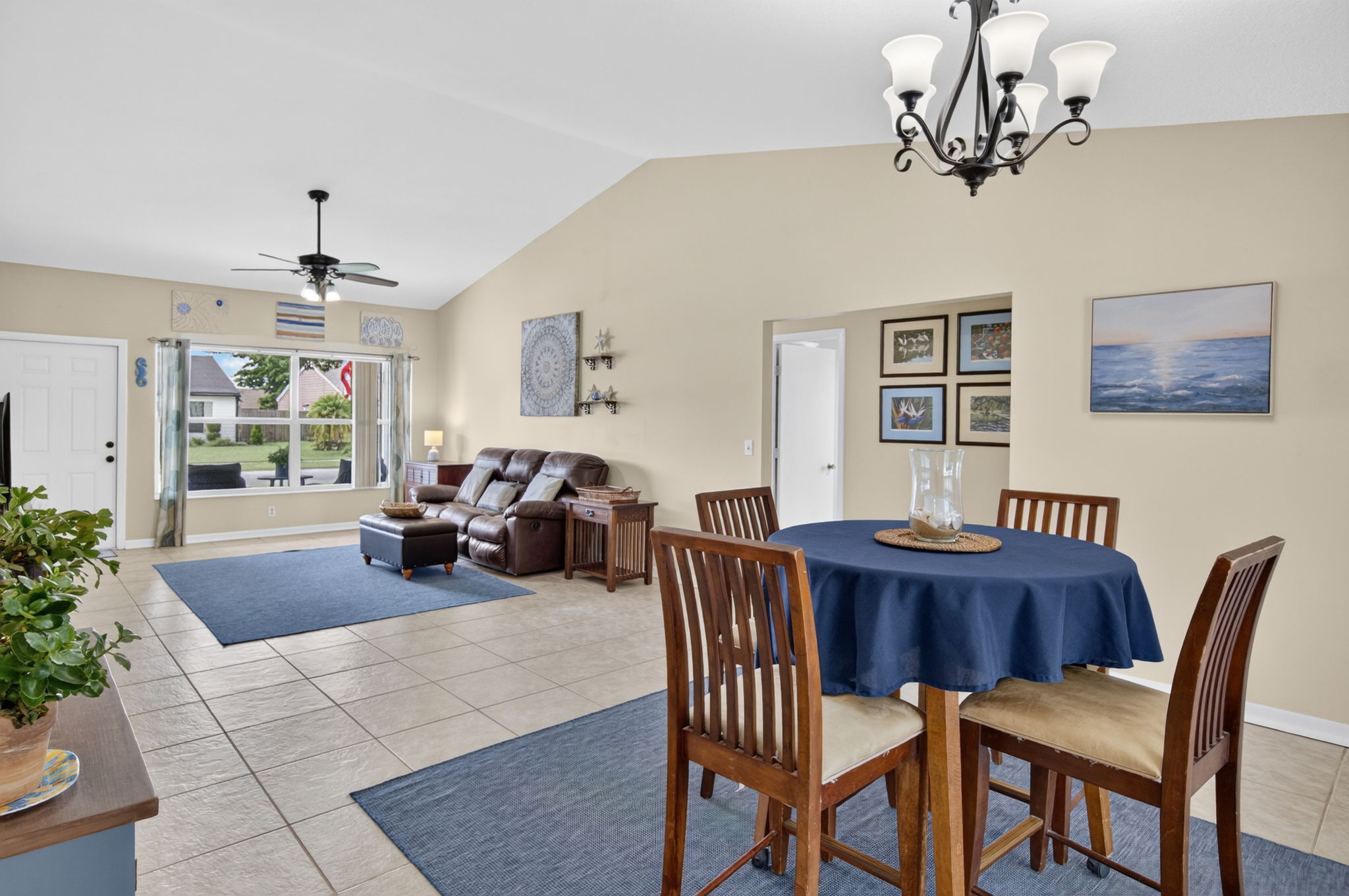 Living room at the just listed Lake Worth pool home with vaulted ceilings